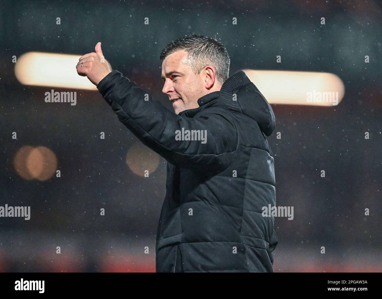 Plymouth Argyle Manager Steven Schumacher celebrates a win at full time and applauds the fans with thumb up during the Sky Bet League 1 match Accrington Stanley vs Plymouth Argyle at Wham Stadium, Accrington, United Kingdom, 21st March 2023  (Photo by Stan Kasala/News Images) Stock Photo