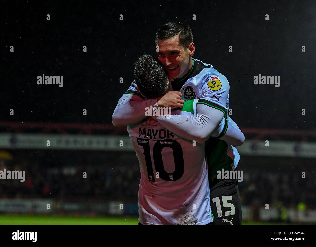 Conor Grant #15 of Plymouth Argyle shoots and scores a goal scores to make it 0-2during the Sky Bet League 1 match Accrington Stanley vs Plymouth Argyle at Wham Stadium, Accrington, United Kingdom, 21st March 2023  (Photo by Stan Kasala/News Images) Stock Photo