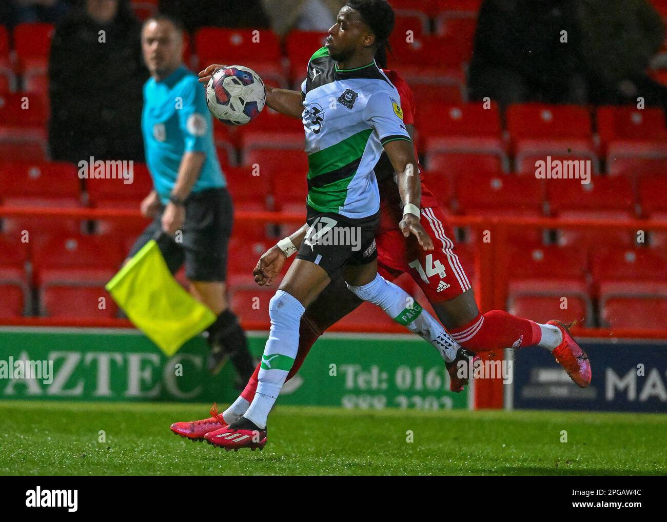 Bali Mumba #17 of Plymouth Argyle   in action during the Sky Bet League 1 match Accrington Stanley vs Plymouth Argyle at Wham Stadium, Accrington, United Kingdom, 21st March 2023  (Photo by Stan Kasala/News Images) Stock Photo