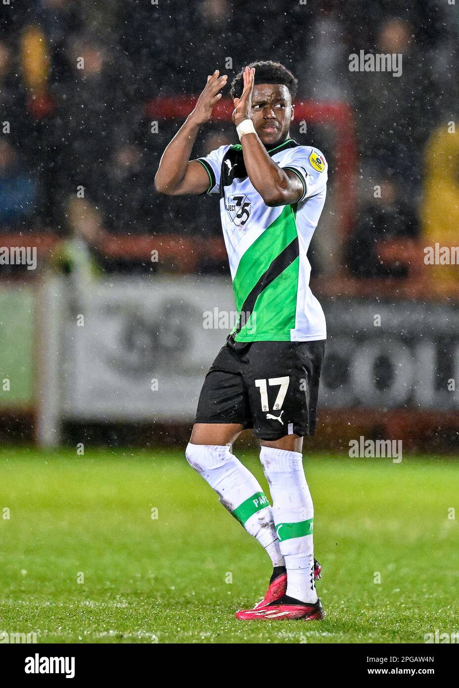 Bali Mumba #17 of Plymouth Argyle   is substituted off and applaud fans during the Sky Bet League 1 match Accrington Stanley vs Plymouth Argyle at Wham Stadium, Accrington, United Kingdom, 21st March 2023  (Photo by Stan Kasala/News Images) Stock Photo