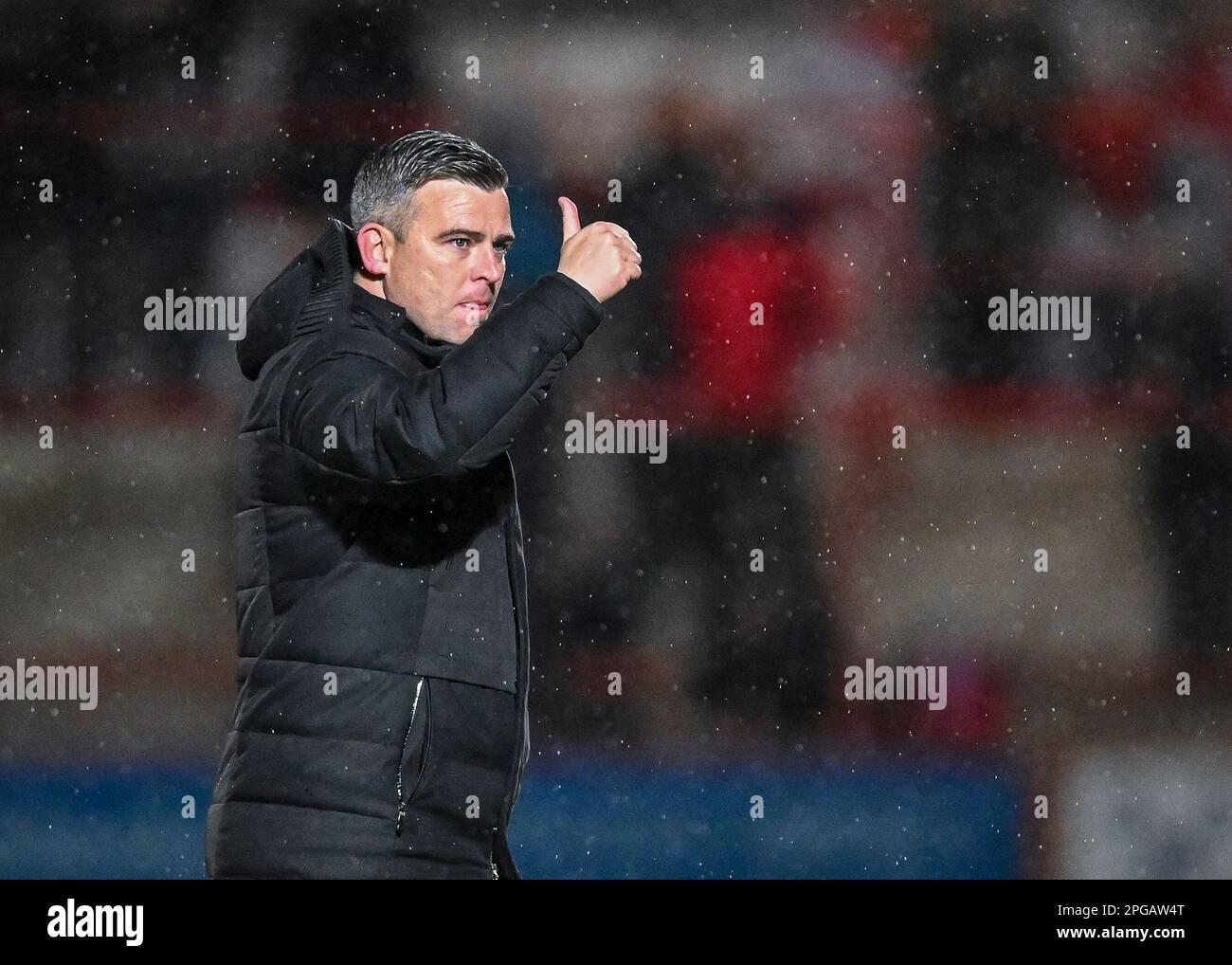 Plymouth Argyle Manager Steven Schumacher  celebrates a win at full time and applauds the fans at full time with thumb up during the Sky Bet League 1 match Accrington Stanley vs Plymouth Argyle at Wham Stadium, Accrington, United Kingdom, 21st March 2023  (Photo by Stan Kasala/News Images) Stock Photo