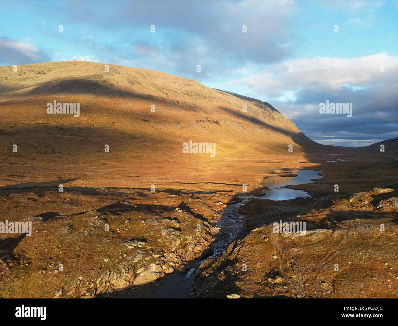 An aerial panorama of the hiking trail between Viterskalet and Syter Mountain Huts, October, Swedish Lapland Stock Photo
