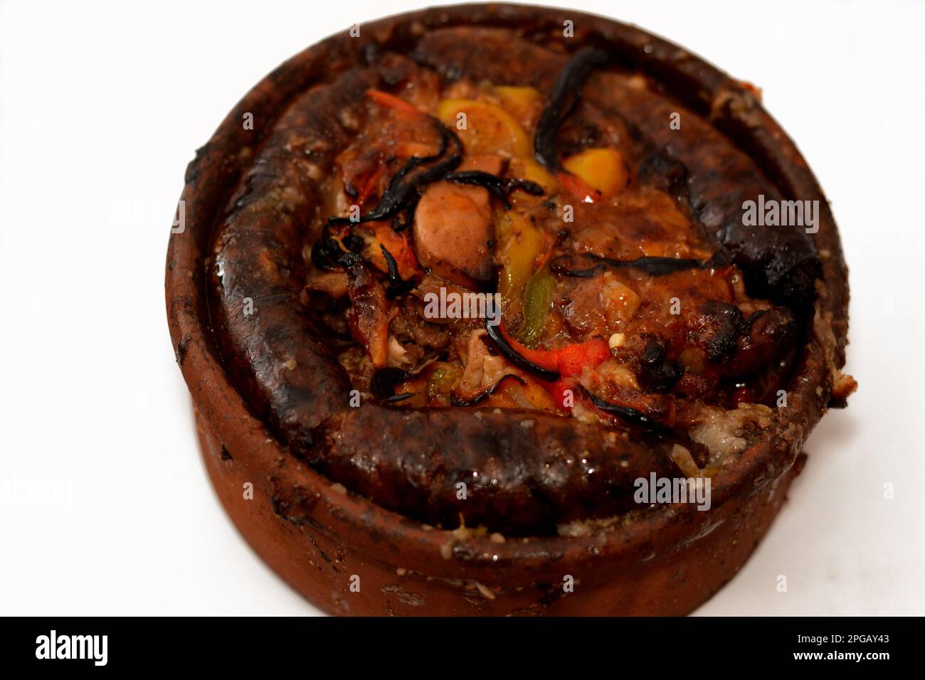 Traditional Egyptian mixture of lamb meat, sausage mumbar intestines filled with rice, kawareh trotters cow feet, pieces of cooked kidneys, hearts and Stock Photo