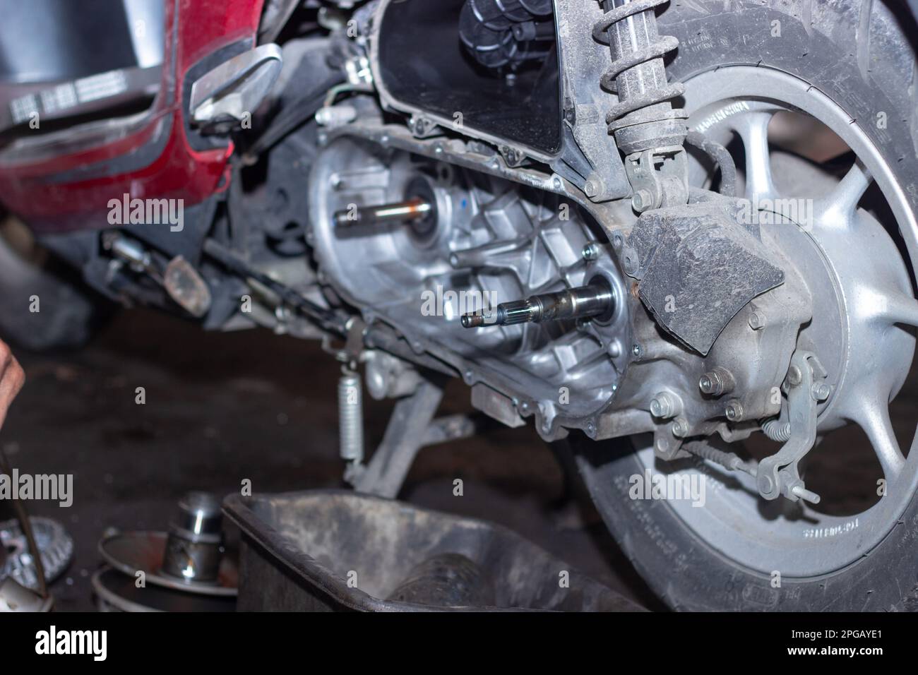 Motorcycle mechanic check the condition of Auto Transmission system or