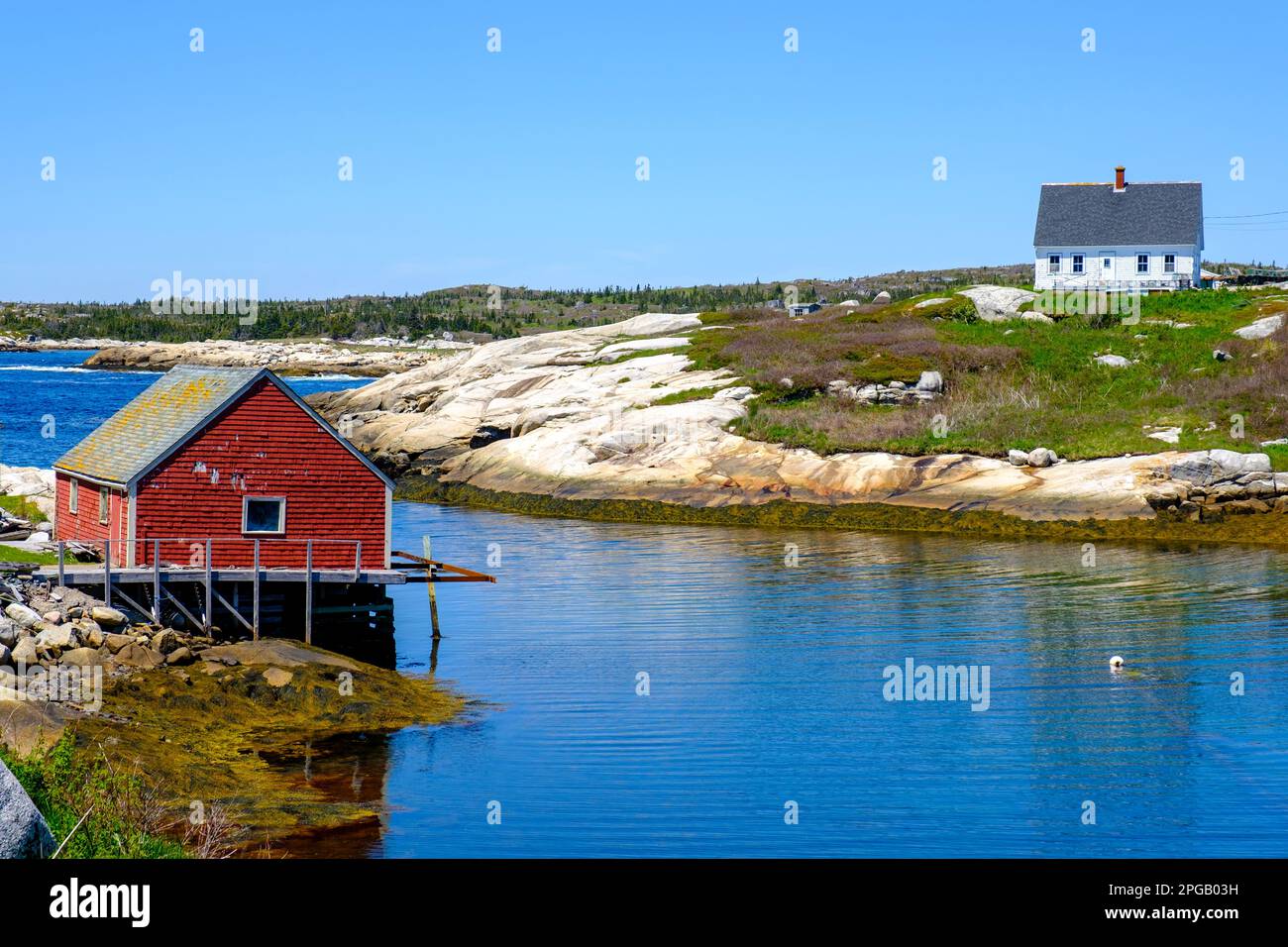 Peggy's Cove fishing village fishermen's houses by the ocean, Nova Scotia, Maritimes, Canada Stock Photo