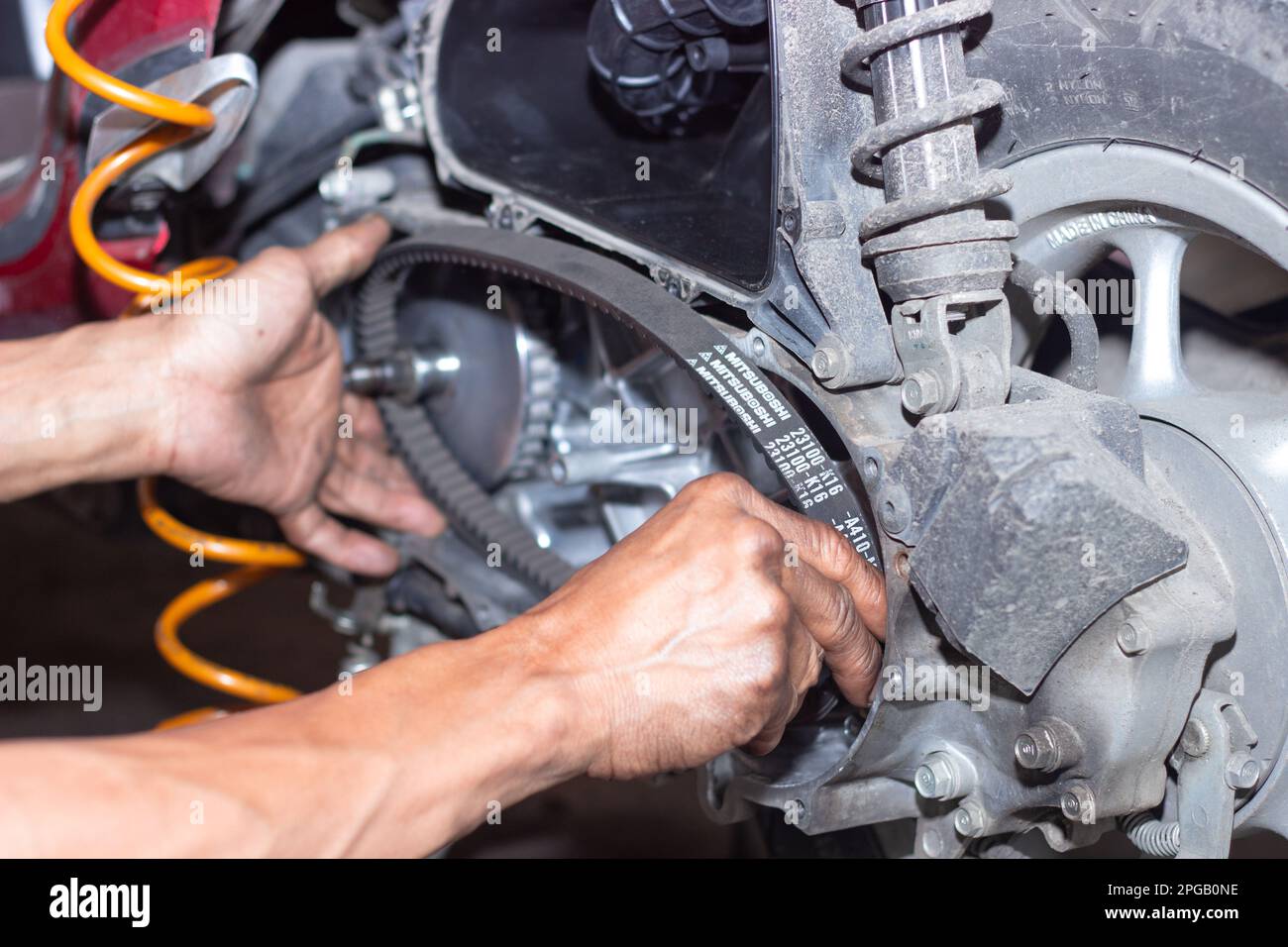 Motorcycle mechanic check the condition of Auto Transmission system or