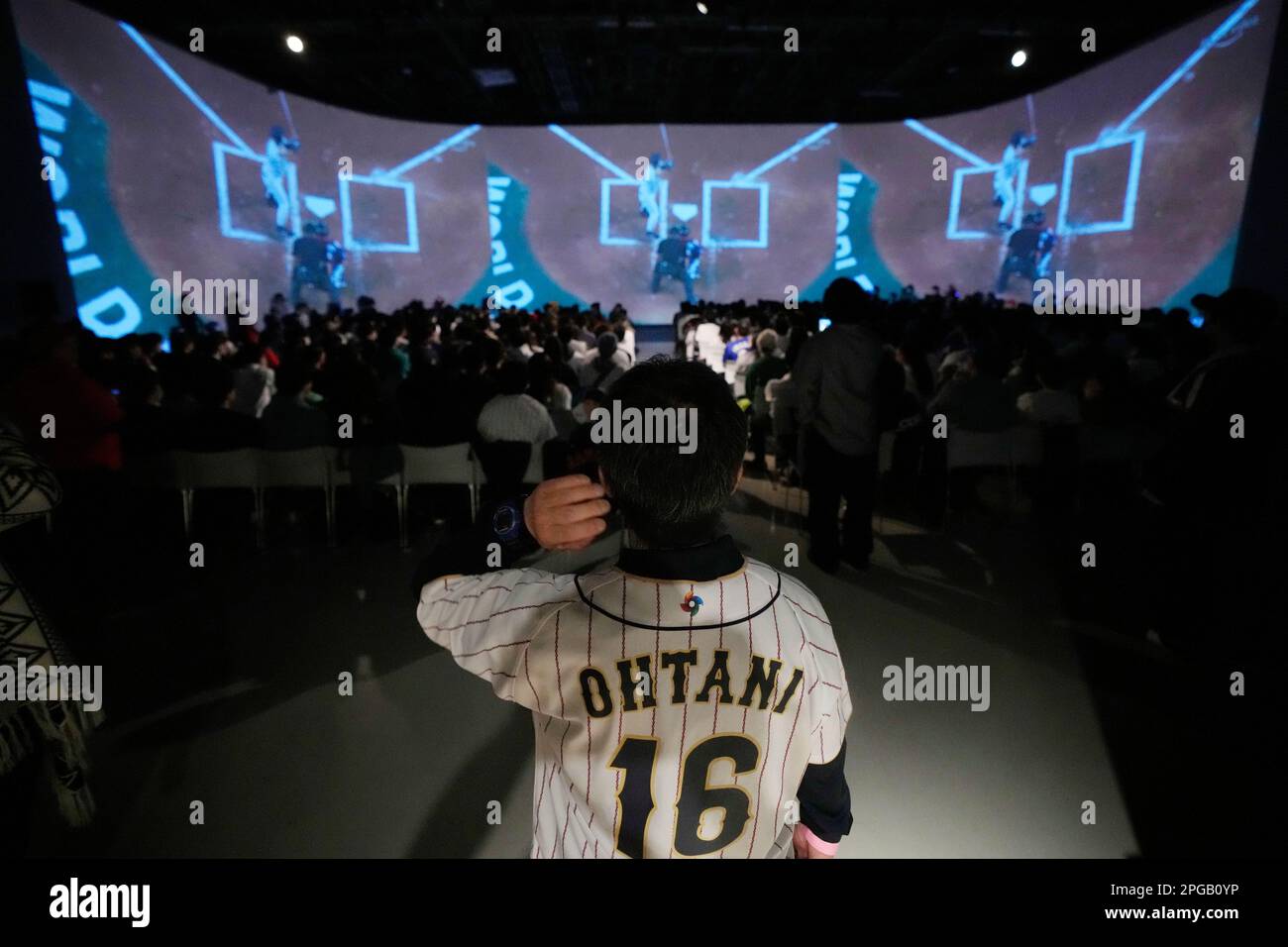 People watch on a live stream of a World Baseball Classic (WBC) final