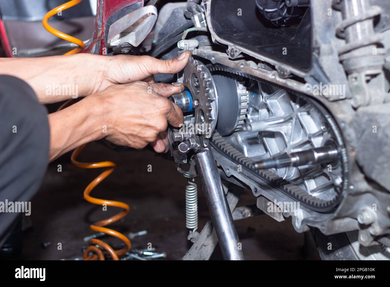 Motorcycle mechanic check the condition of Auto Transmission system or