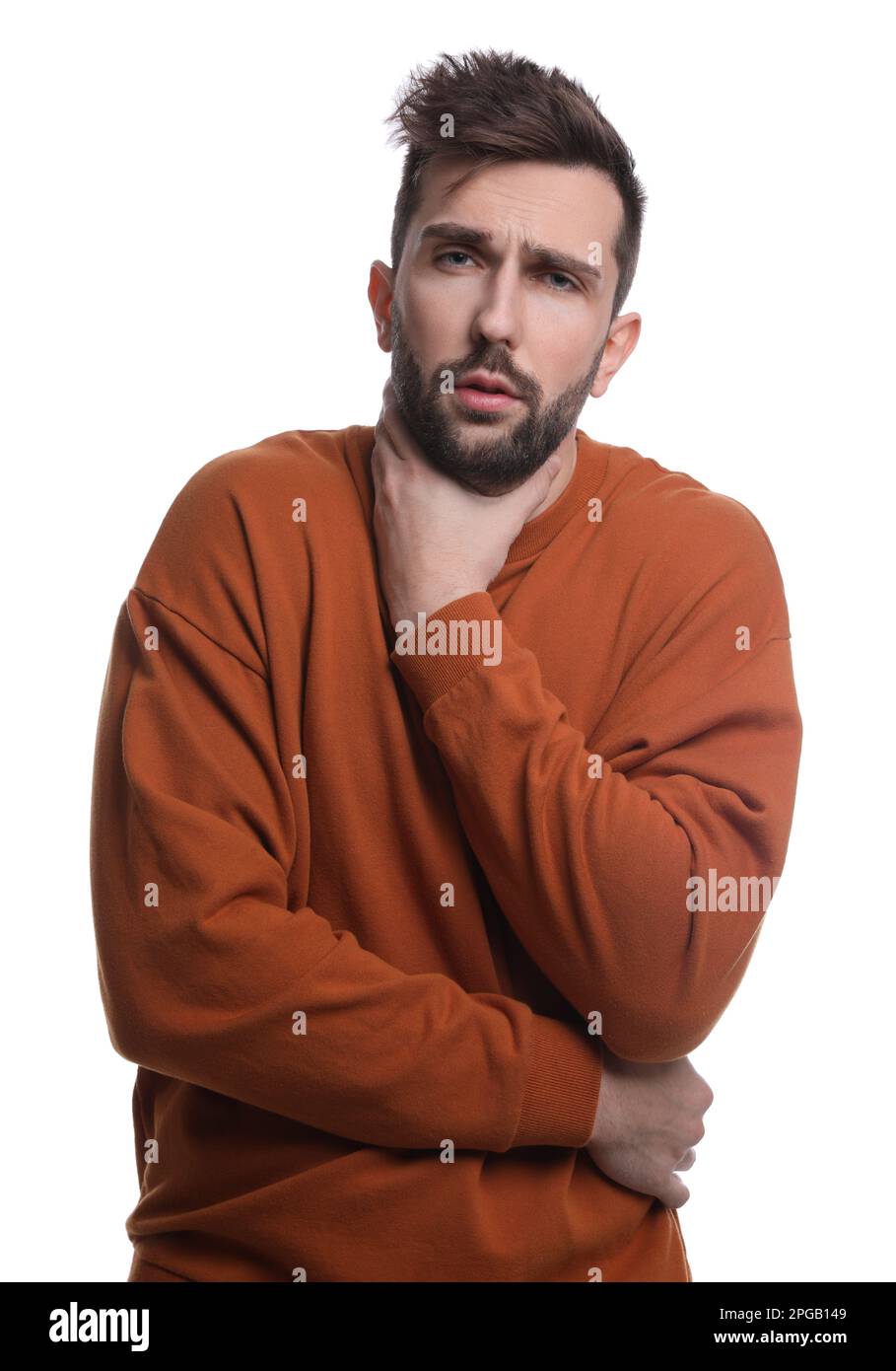 Man suffering from sore throat on white background. Cold symptoms Stock