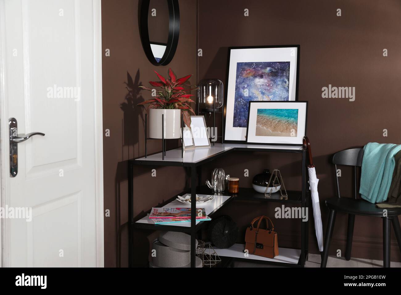 Hallway interior with console table and stylish decor Stock Photo - Alamy