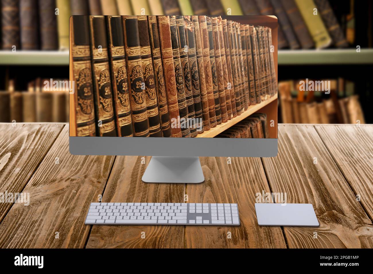 Old book on desktop modern hi-res stock photography and images - Alamy