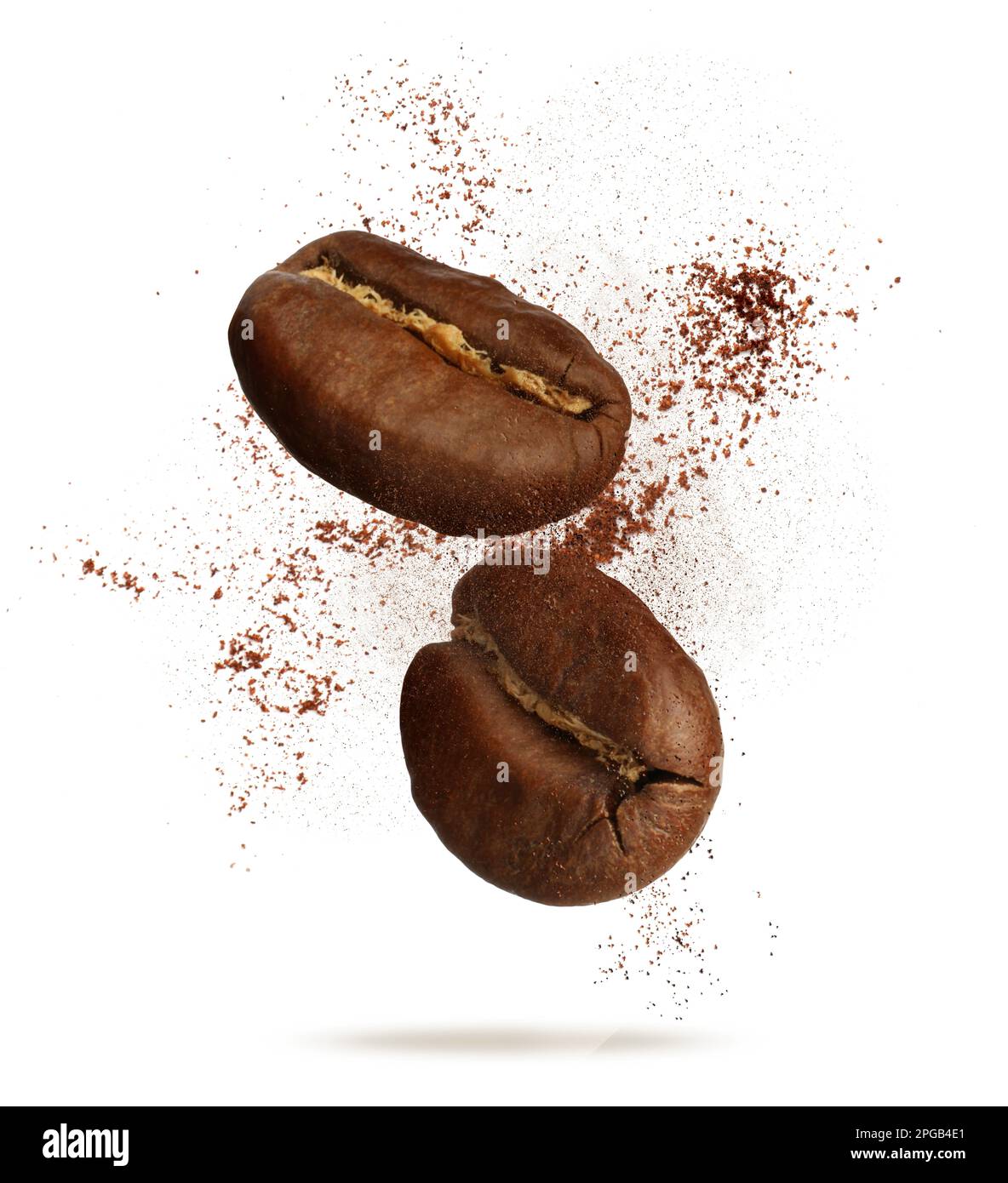 Aromatic ground coffee and beans falling on white background Stock
