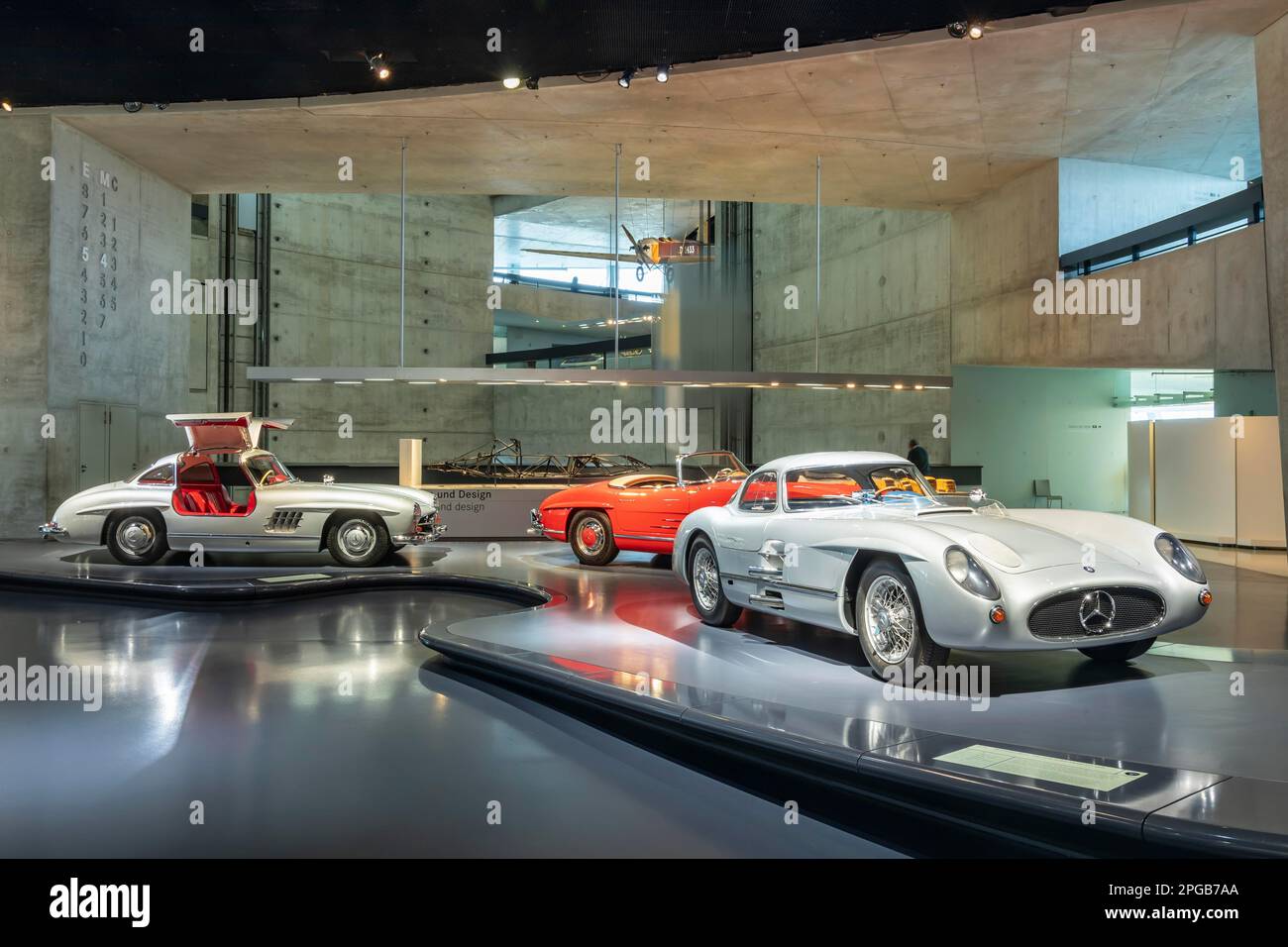 From left Mercedes-Benz 300 SL Coupe (1955) Gullwing, 300 SL Roadster (1962), 300 SLR Uhlenhaut-Coupe (1955), Mercedes Museum, Stuttgarts most Stock Photo