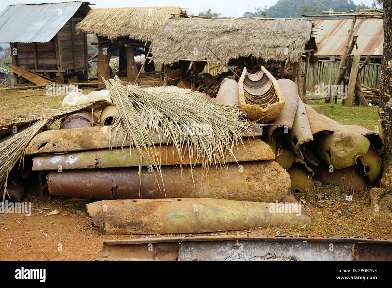Bomb casings, Hmong village, Hmong, Hmong people, near Phonsavan, Xieng Khoungang province, Aien, Laos Stock Photo