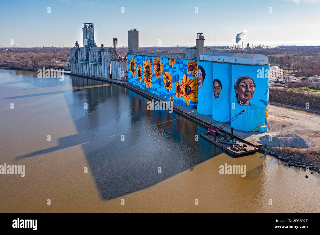 Toledo, Ohio, The Glass City River Wall, a sunflower mural by Gabe