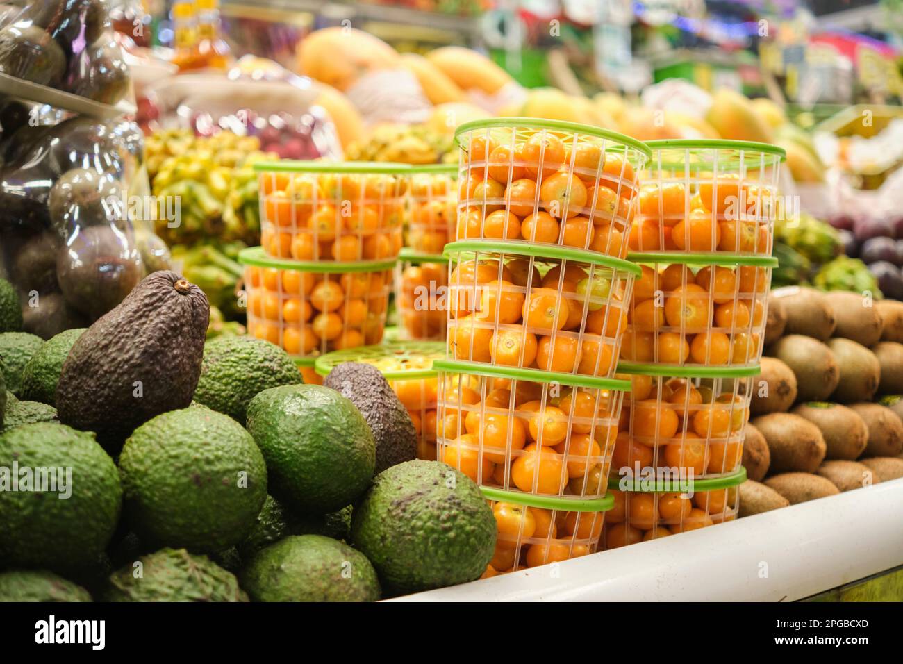 Gooseberries or goldenberries for sale at a fruit and vegetable market stall in Colombia. Stock Photo