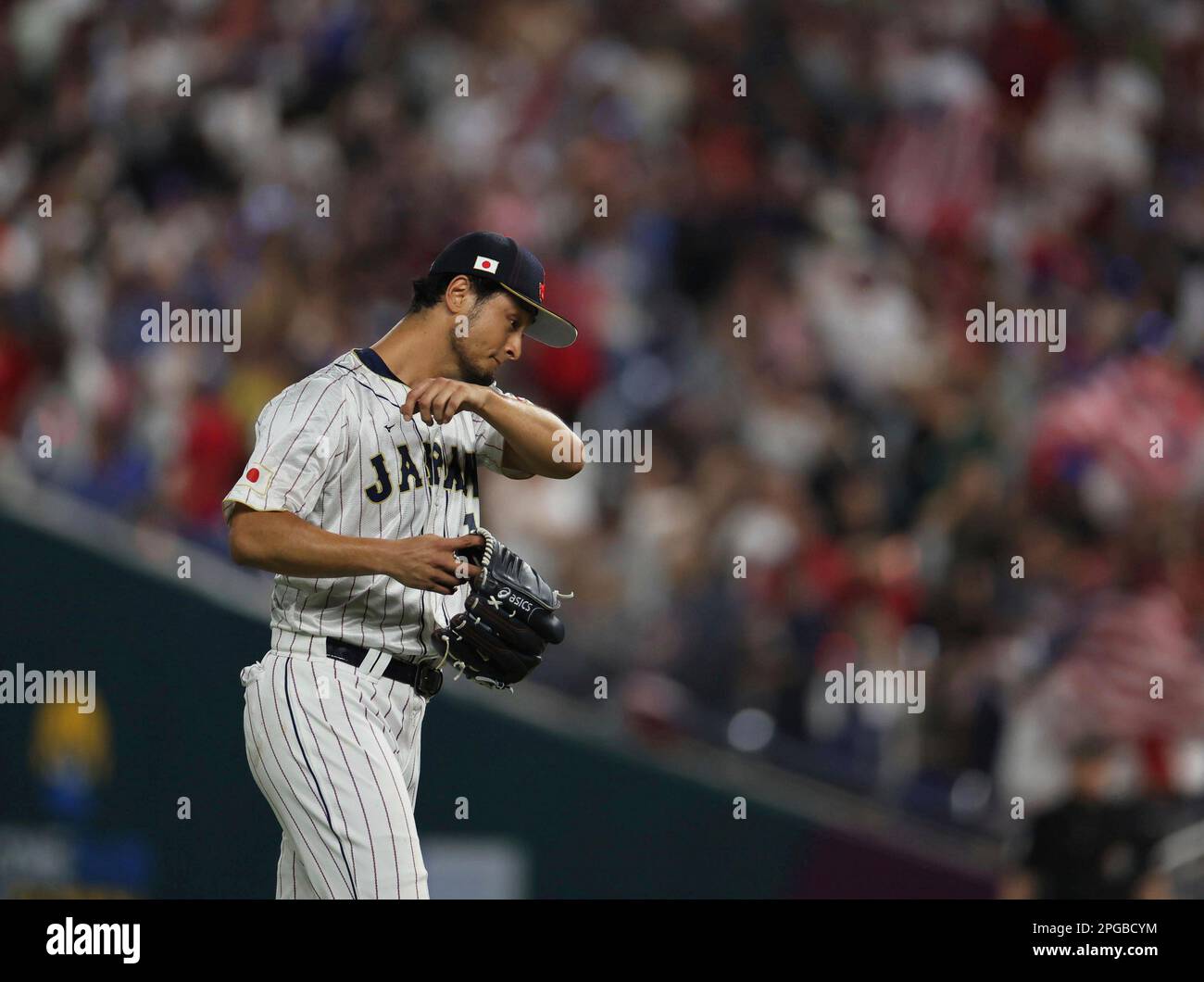 Japan's Yu Darvish wipes his face at the World Baseball Classic (WBC ...