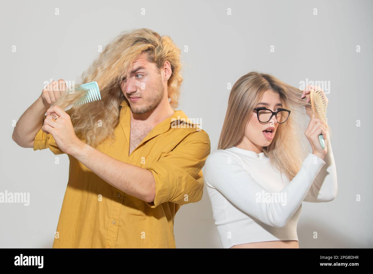 Messy hair, sad couple with hairloss problem. Stock Photo