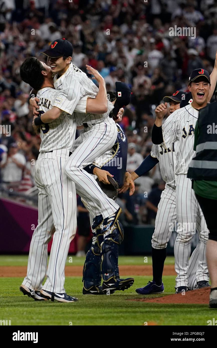 Japan players celebrate after winning the World Baseball Classic final game against the U.S