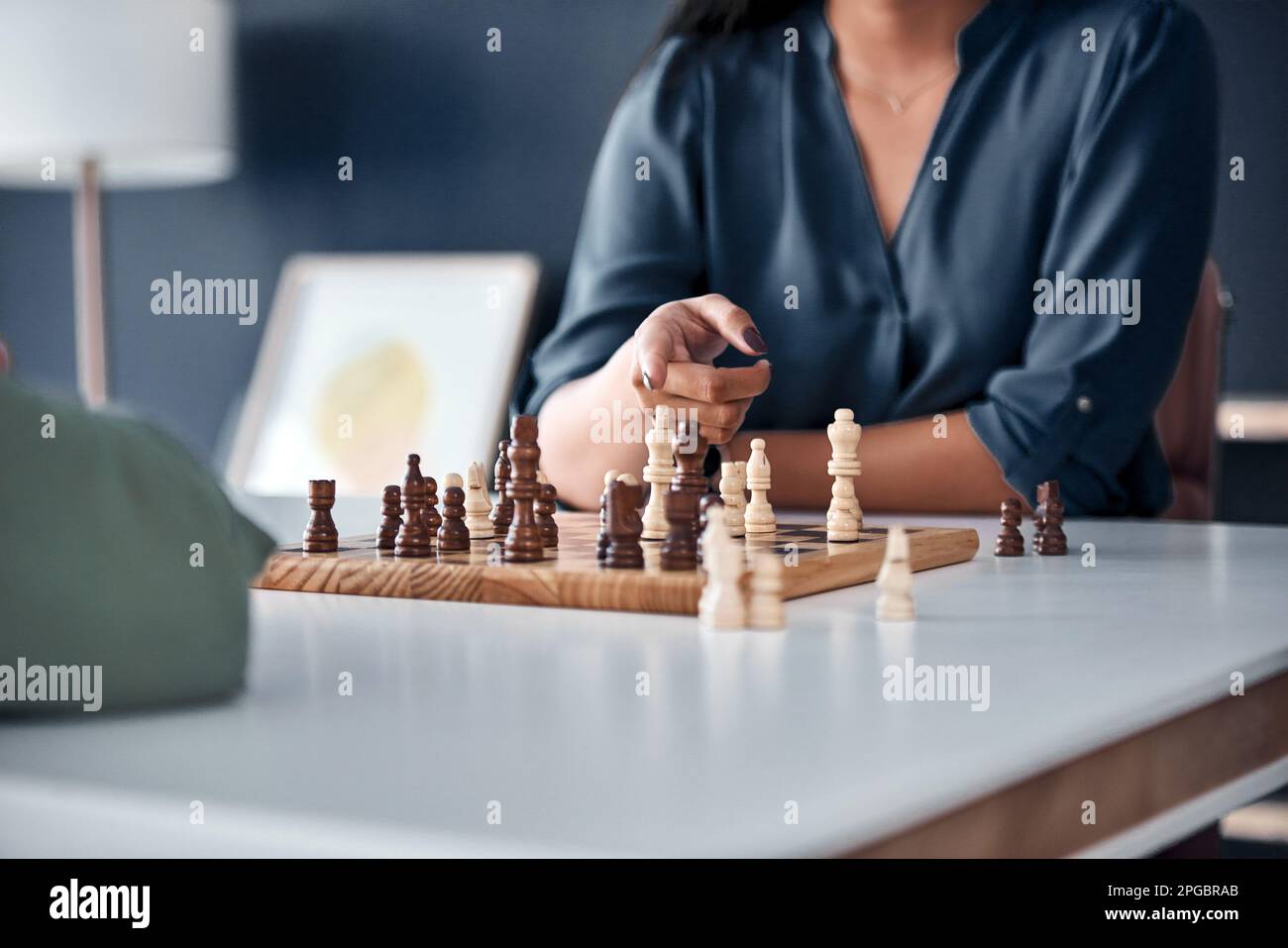 Two business women play chess hi-res stock photography and images - Alamy