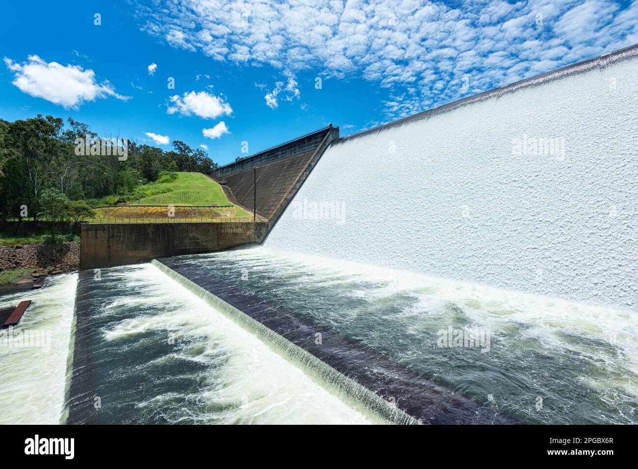 Lake Tinaroo Dam flowing over the spillway in a rare occurrence