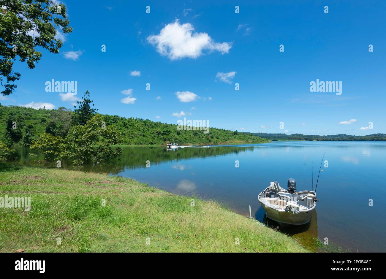 Fishing boat on Lake Tinaroo, a popular scenic tourist attraction