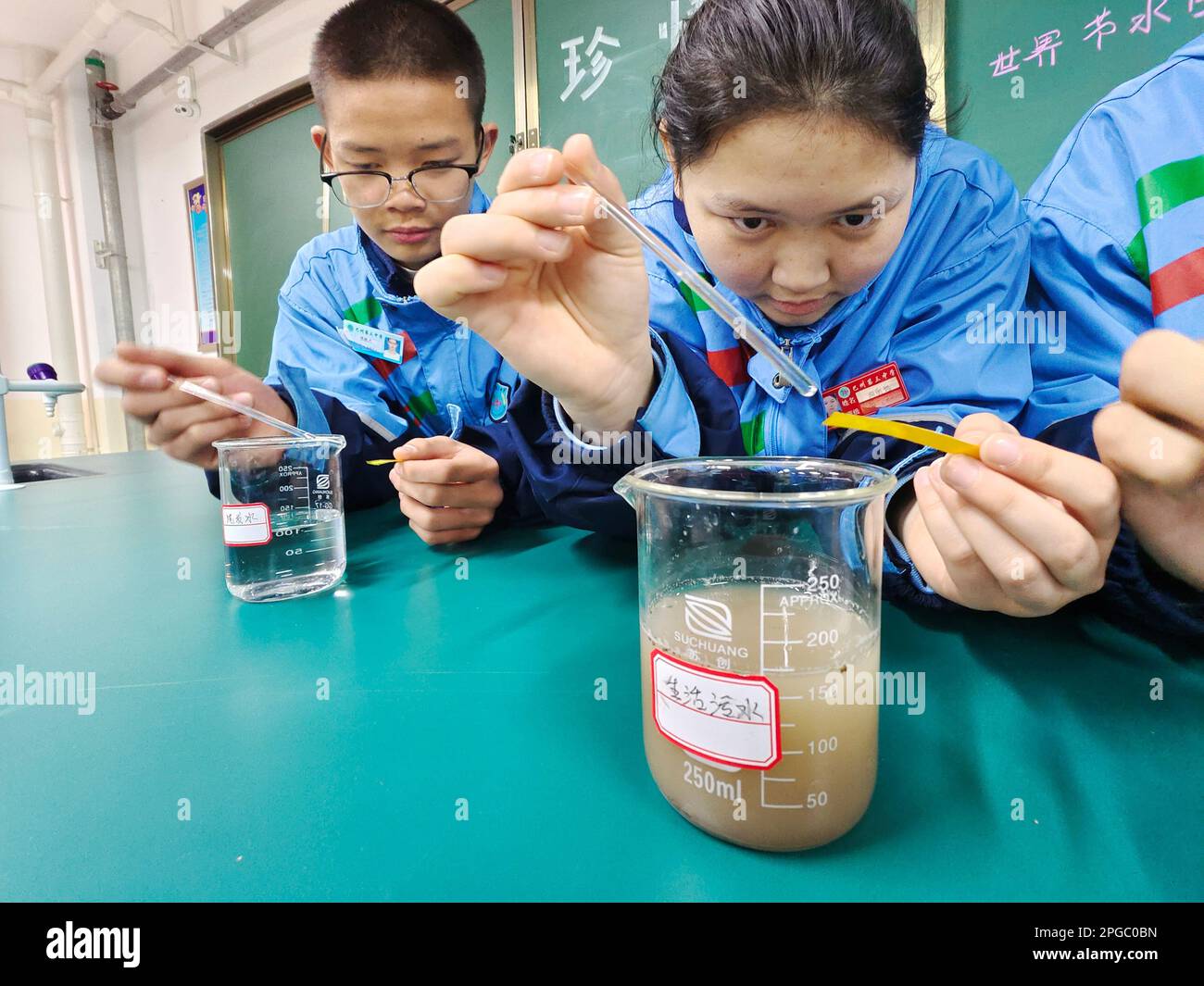 BAZHOU, CHINA - MARCH 22, 2023 - Students perform a PH test on a common wastewater in Bazhou, Xinjiang Province, China, March 22, 2023. March 22, 2023 Stock Photo