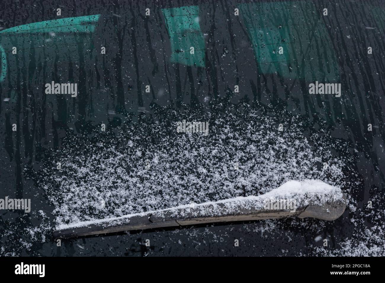 the car glass is frozen. frozen wipers. winter driver problem Stock