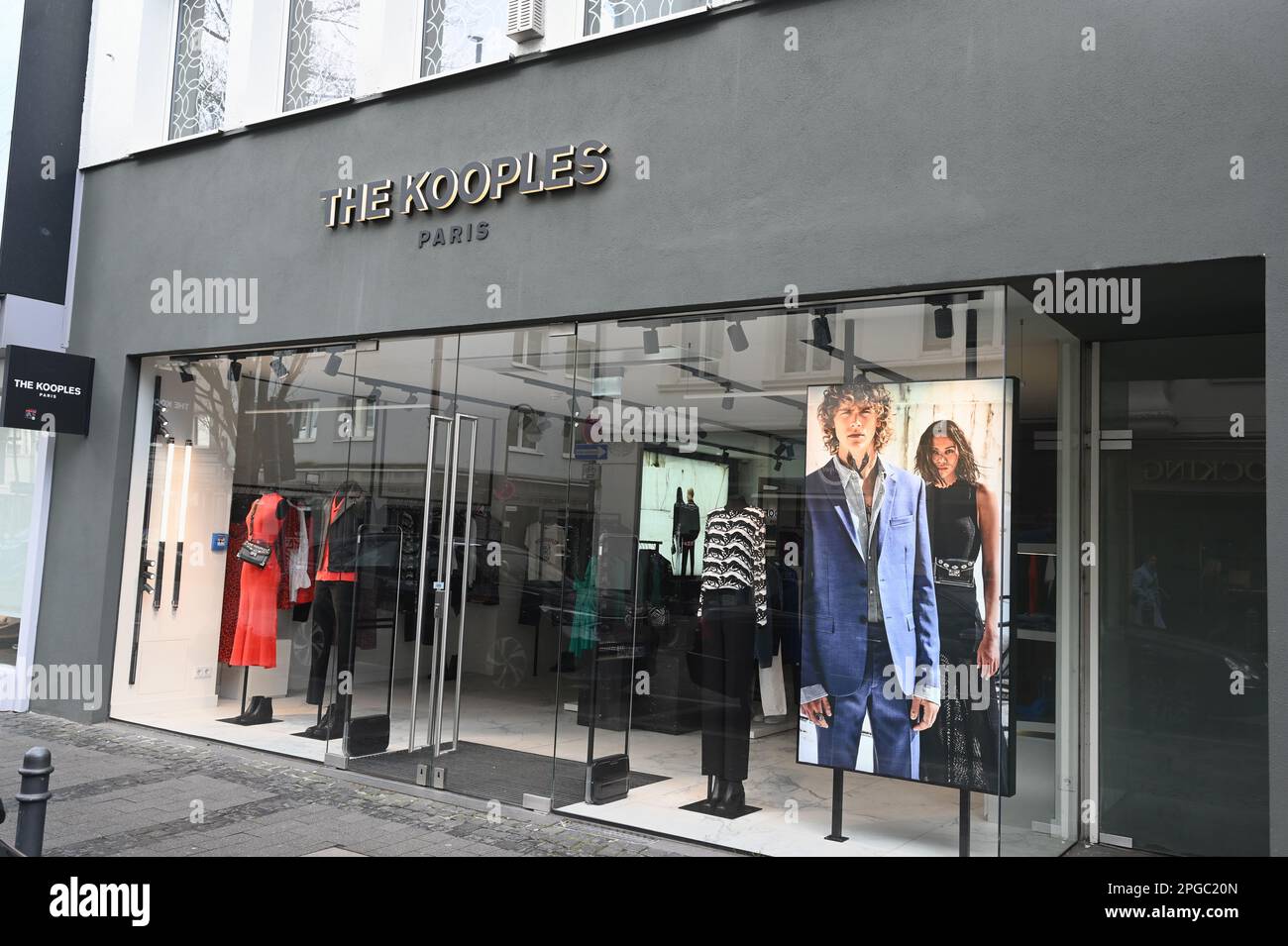 Cologne, Germany. 19th Mar, 2023. Logo, lettering on a branch of the French fashion brand The Kooples Credit: Horst Galuschka/dpa/Alamy Live News Stock Photo