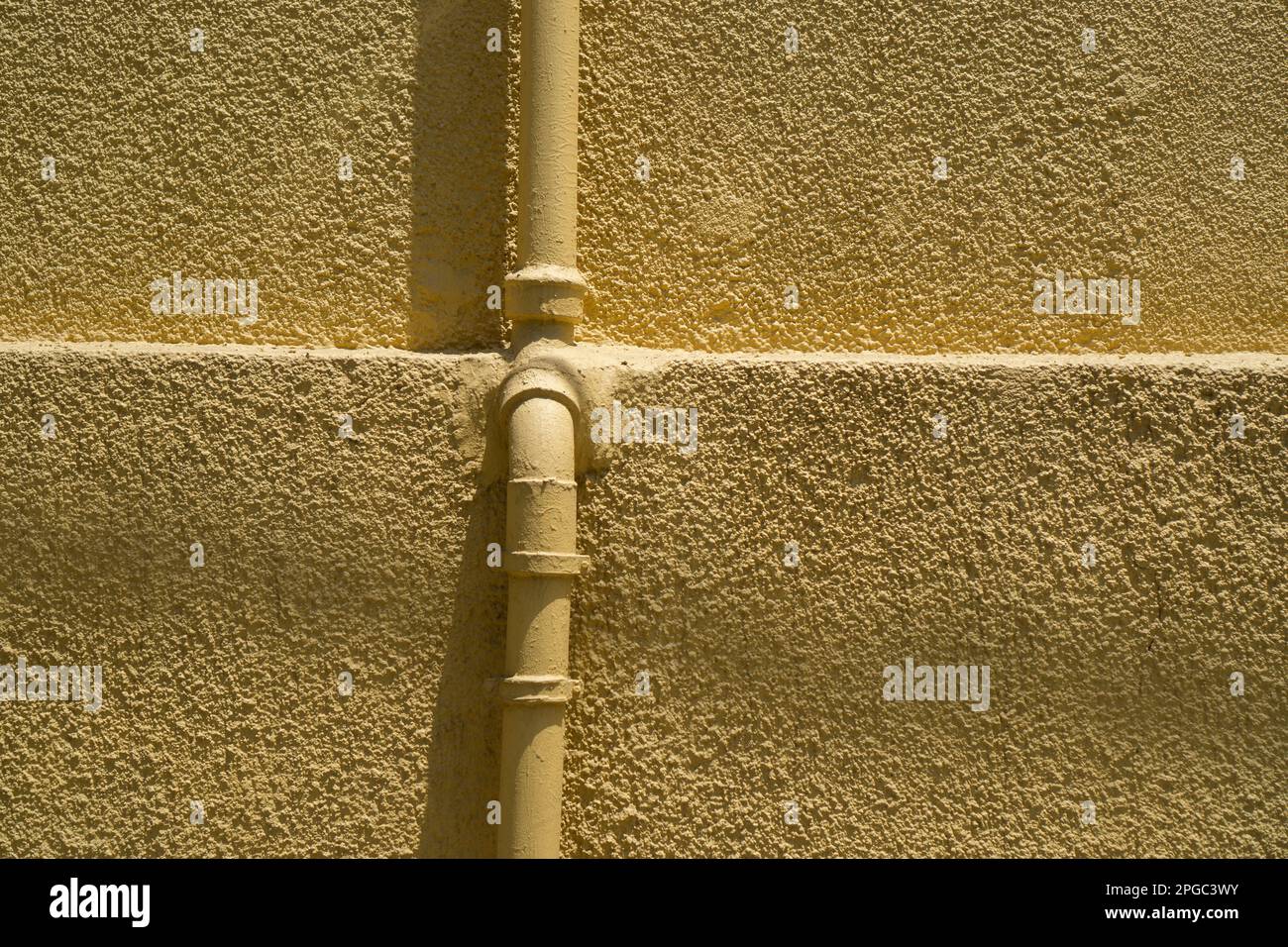 Pipe on the wall Stock Photo - Alamy