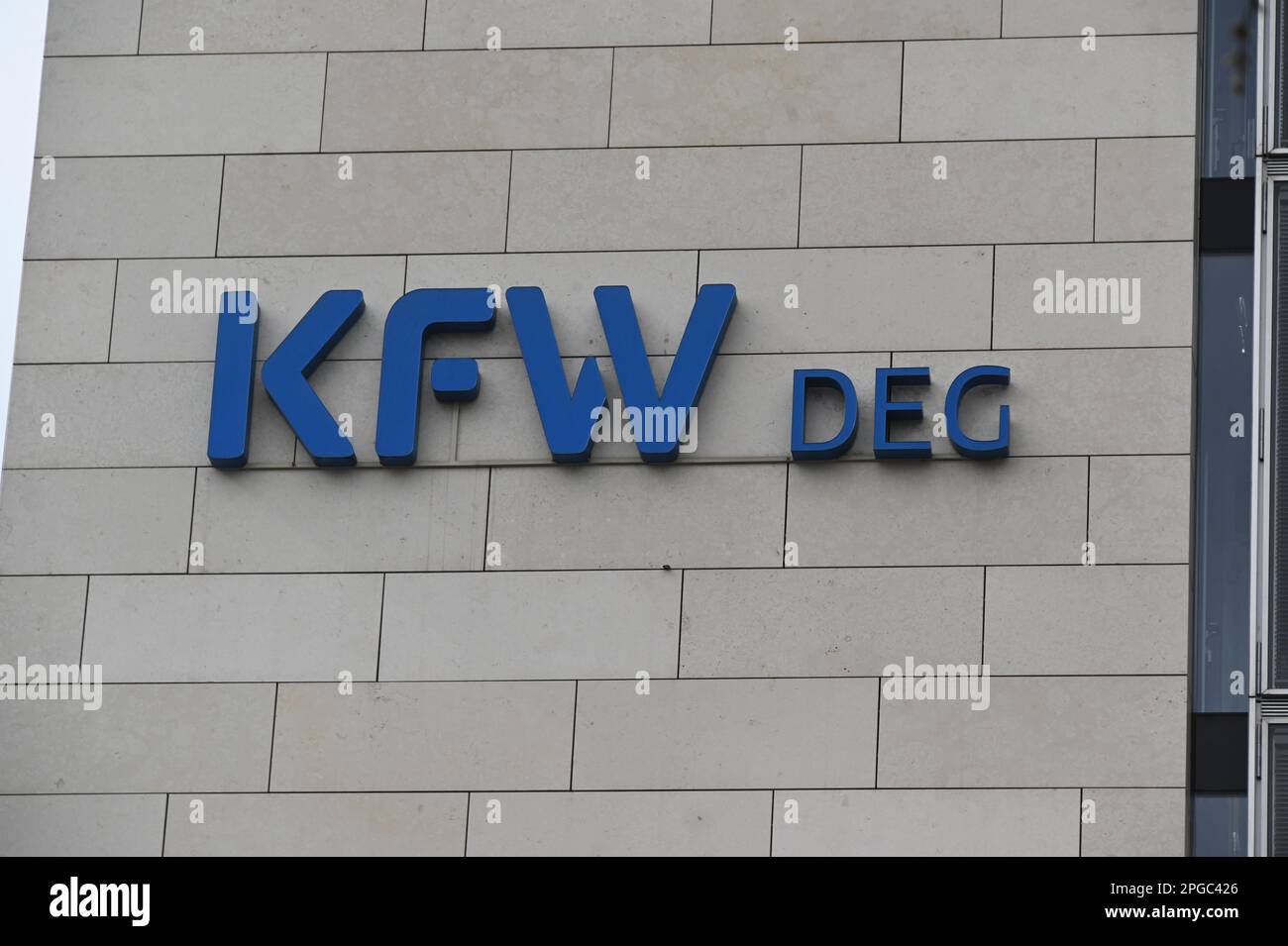 Cologne, Germany. 19th Mar, 2023. Logo, lettering KFW DEG - Deutsche Investitions- und Entwicklungsgesellschaft mbH, DEG is a wholly owned subsidiary of KfW Bankengruppe KfW or Kreditanstalt für Wiederaufbau is a German development bank and one of the leading development banks in the world. Credit: Horst Galuschka/dpa/Alamy Live News Stock Photo