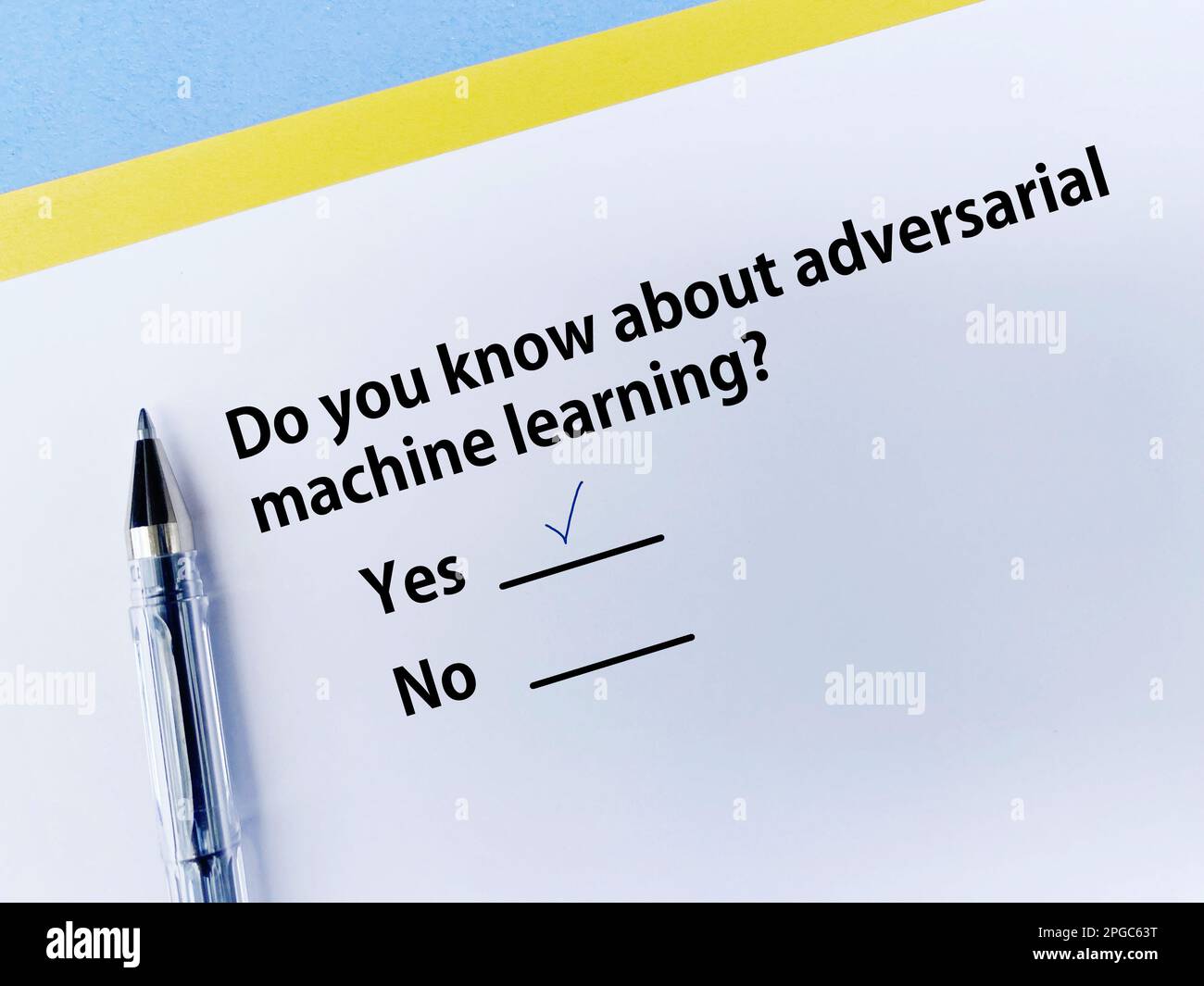 A person is answering question about artificial intelligence. He knows about adversarial machine learning. Stock Photo
