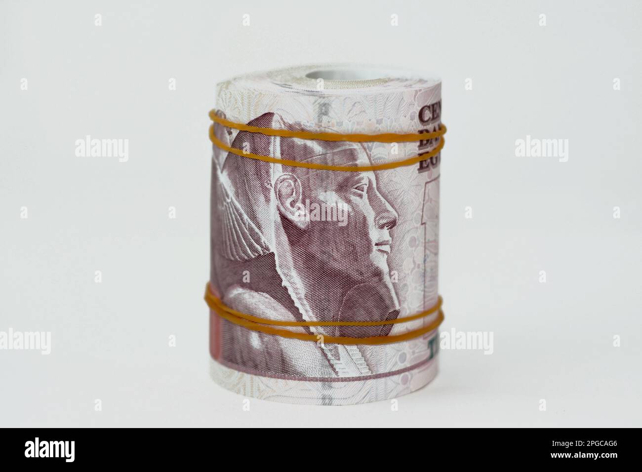 10 EGP LE ten Egyptian pounds cash money bills rolled up with rubber ...