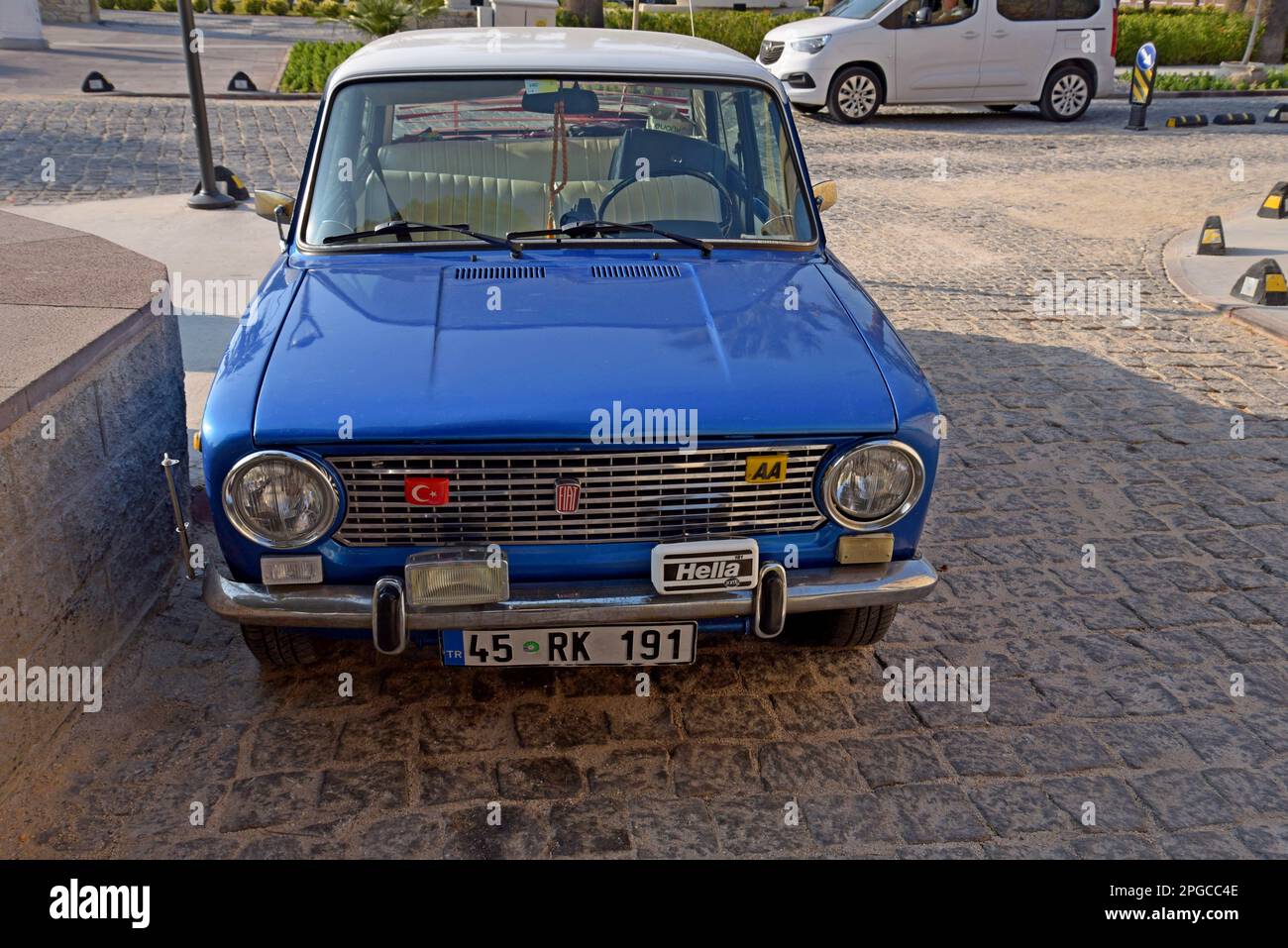 A classic Fiat 124 saloon car on parked in Cesme, Turkey, December 2022 Stock Photo