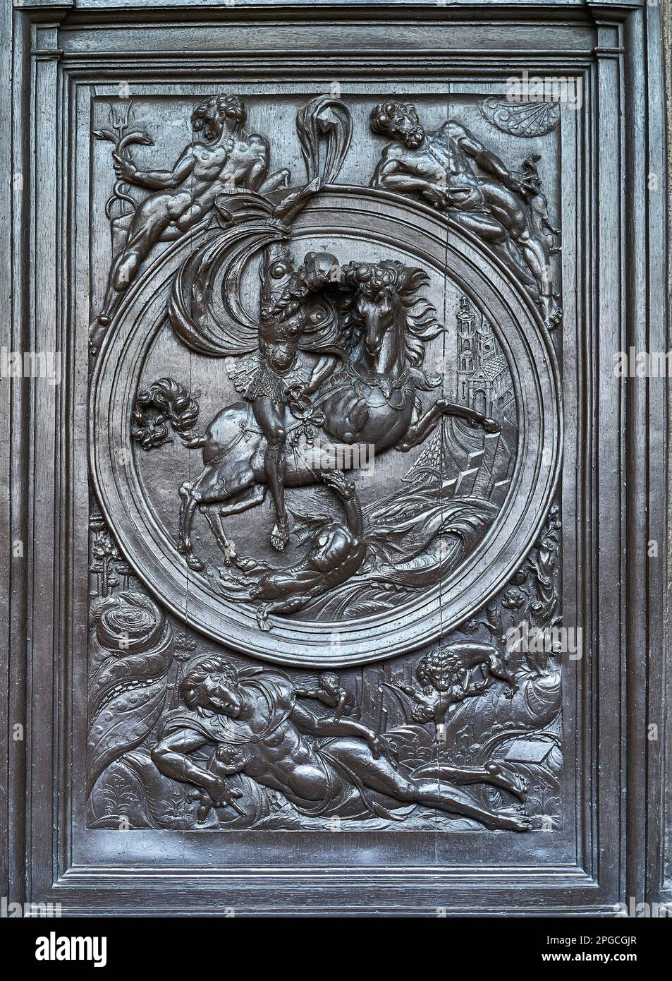 Wooden carving of St George and the dragon on the provost's stall at ...