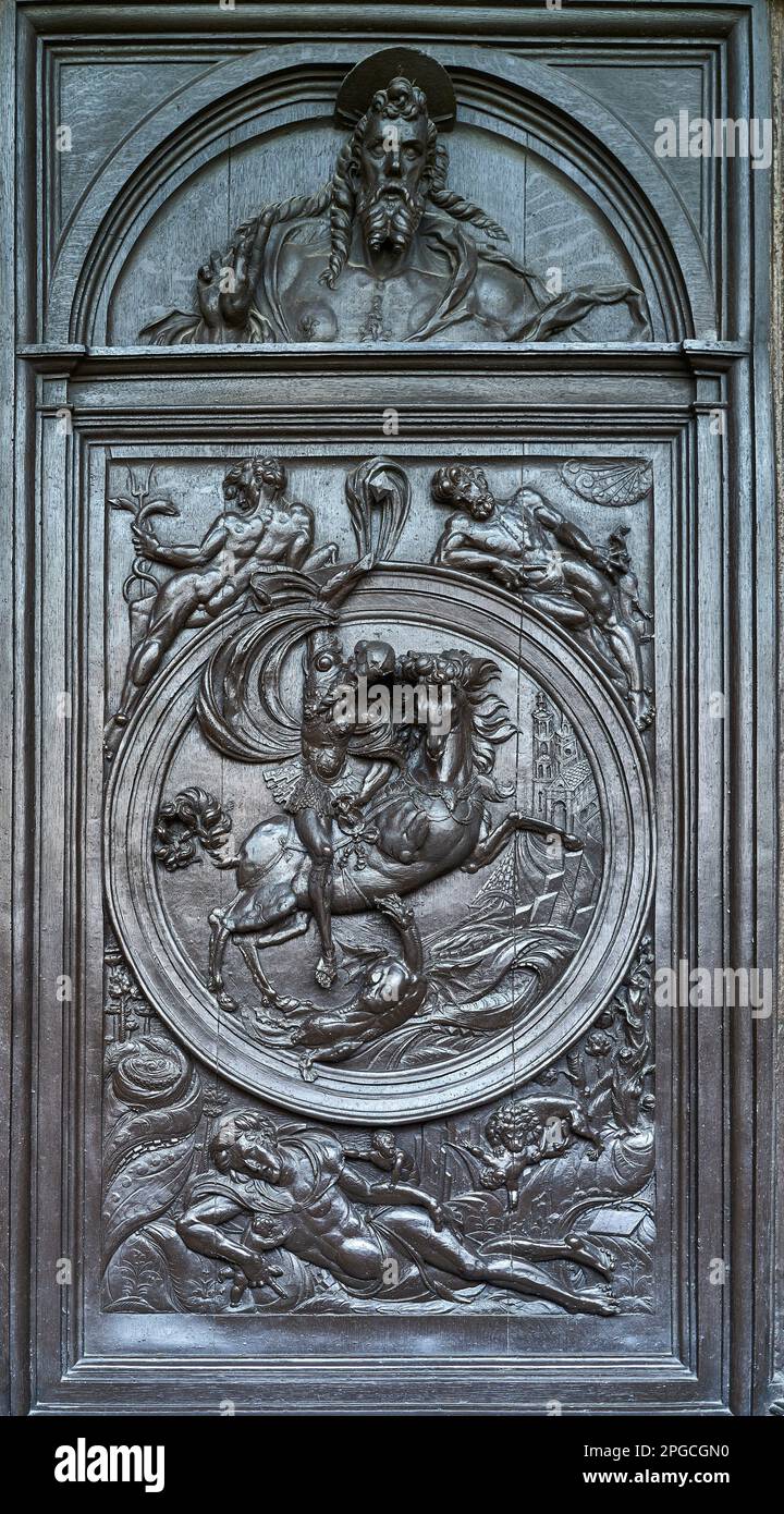 Wooden carving of St George and the dragon on the provost's stall at ...