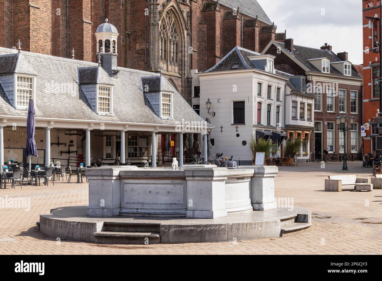 Stone fountain on the large city square - De Hof, in the center of the Dutch city of Amersfoort. Stock Photo