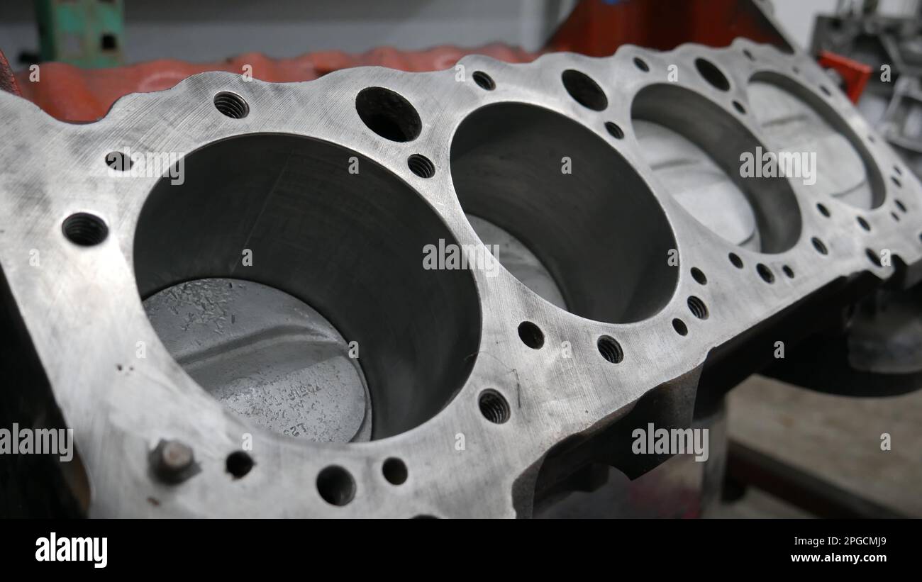 Image of an engine block head in a machine shop environment Stock Photo