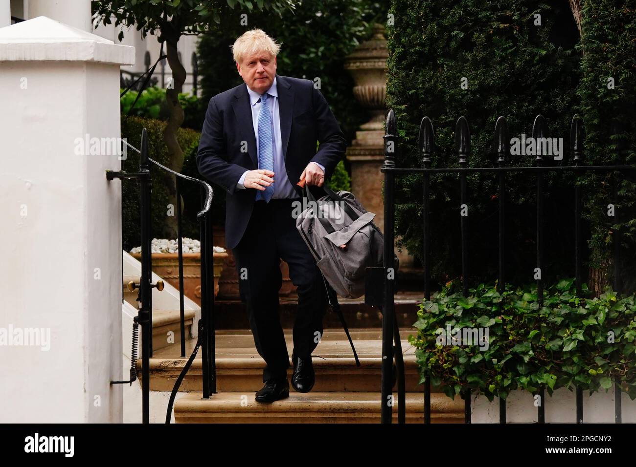 Former prime minister Boris Johnson leaves his home in London. Mr Johnson will give evidence as to whether he knowingly misled Parliament over partygate at a hearing of the Commons Privileges Committee in Portcullis House in central London. Picture date: Wednesday March 22, 2023. Stock Photo