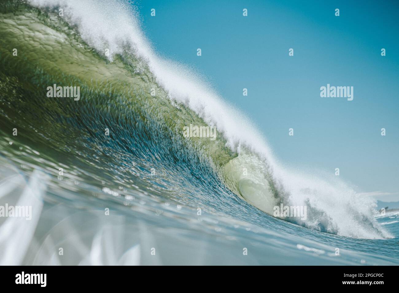 Powerful foamy sea waves rolling and splashing over water surface ...