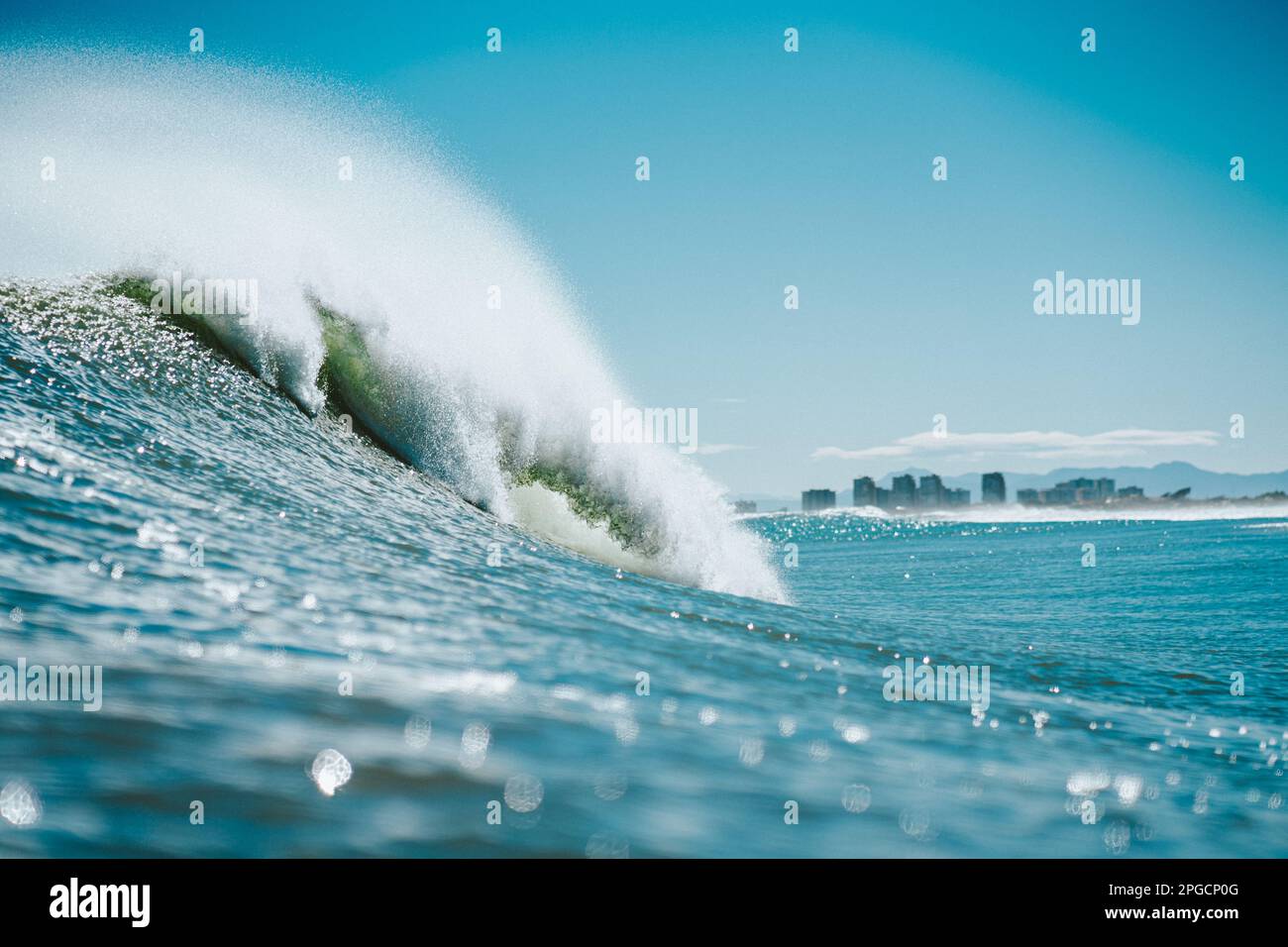 Powerful foamy sea waves rolling and splashing over water surface ...