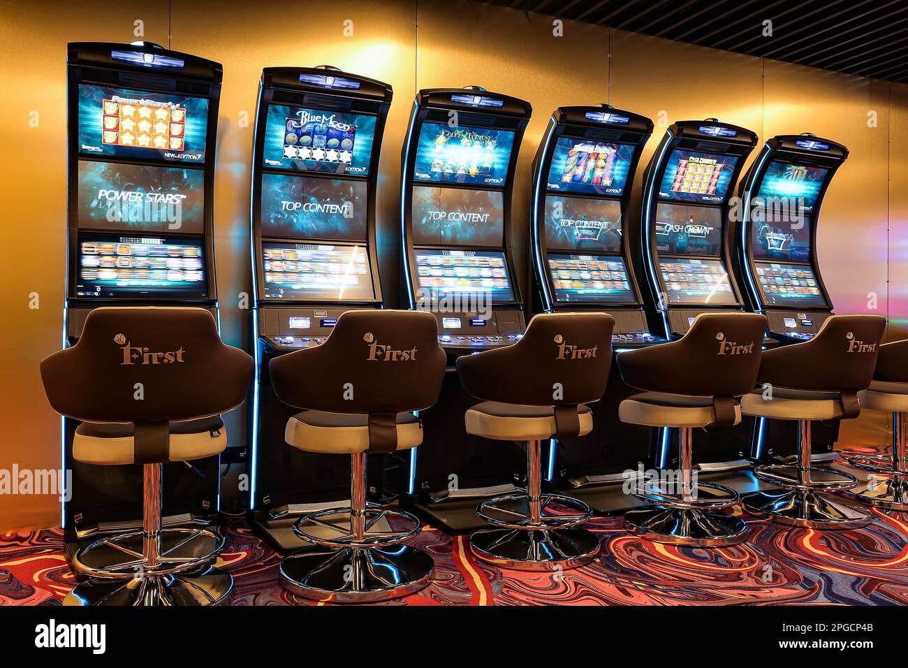 Nikolaev, Ukraine, - October 21, 2021: slot machines of the casino 'First' in the hotel 'Green Day'. Deluxe Game Club in the hotel. The interior of th Stock Photo