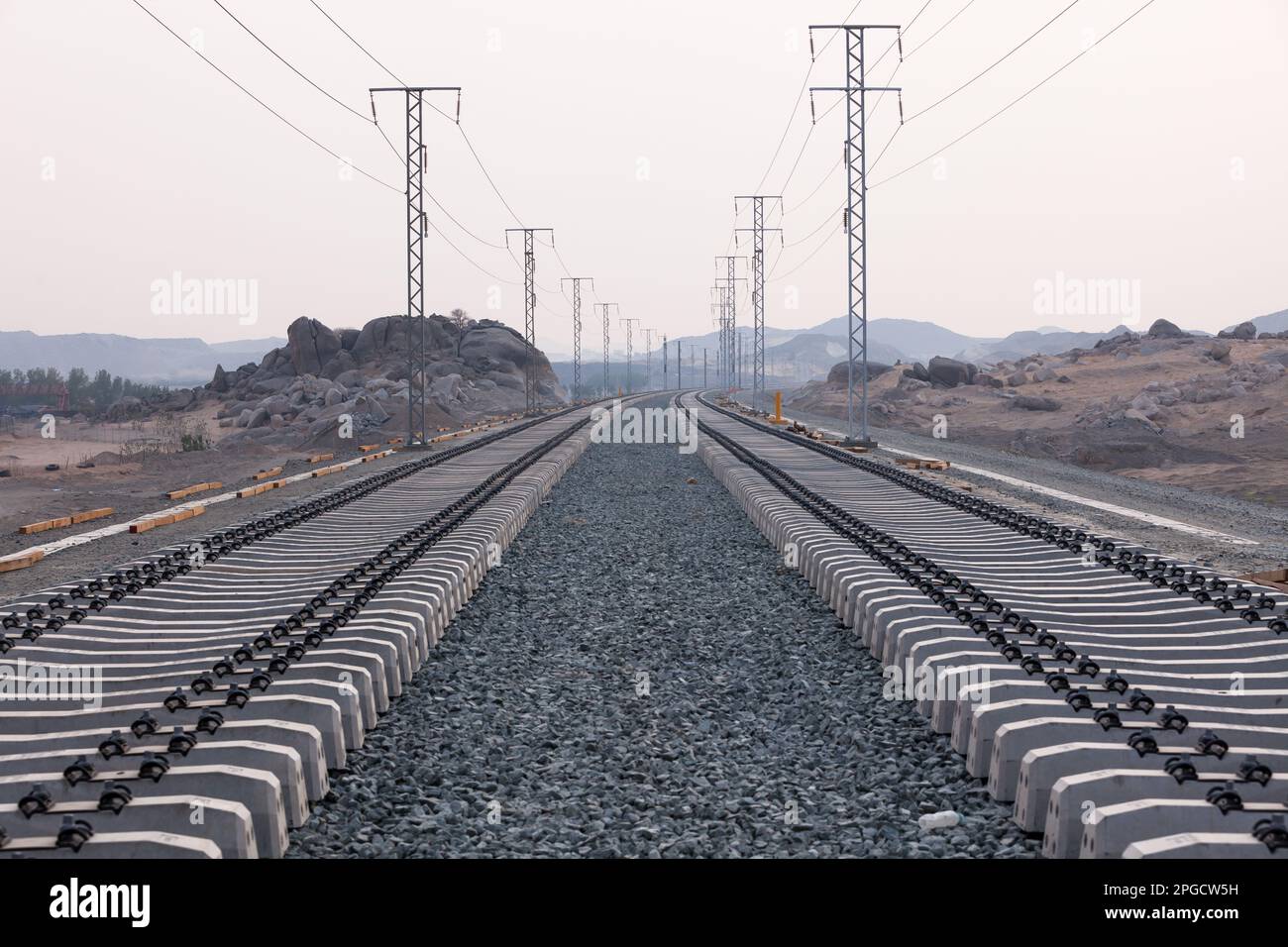 Infrastructure development of laying of dual high speed railway tracks with cement concrete
