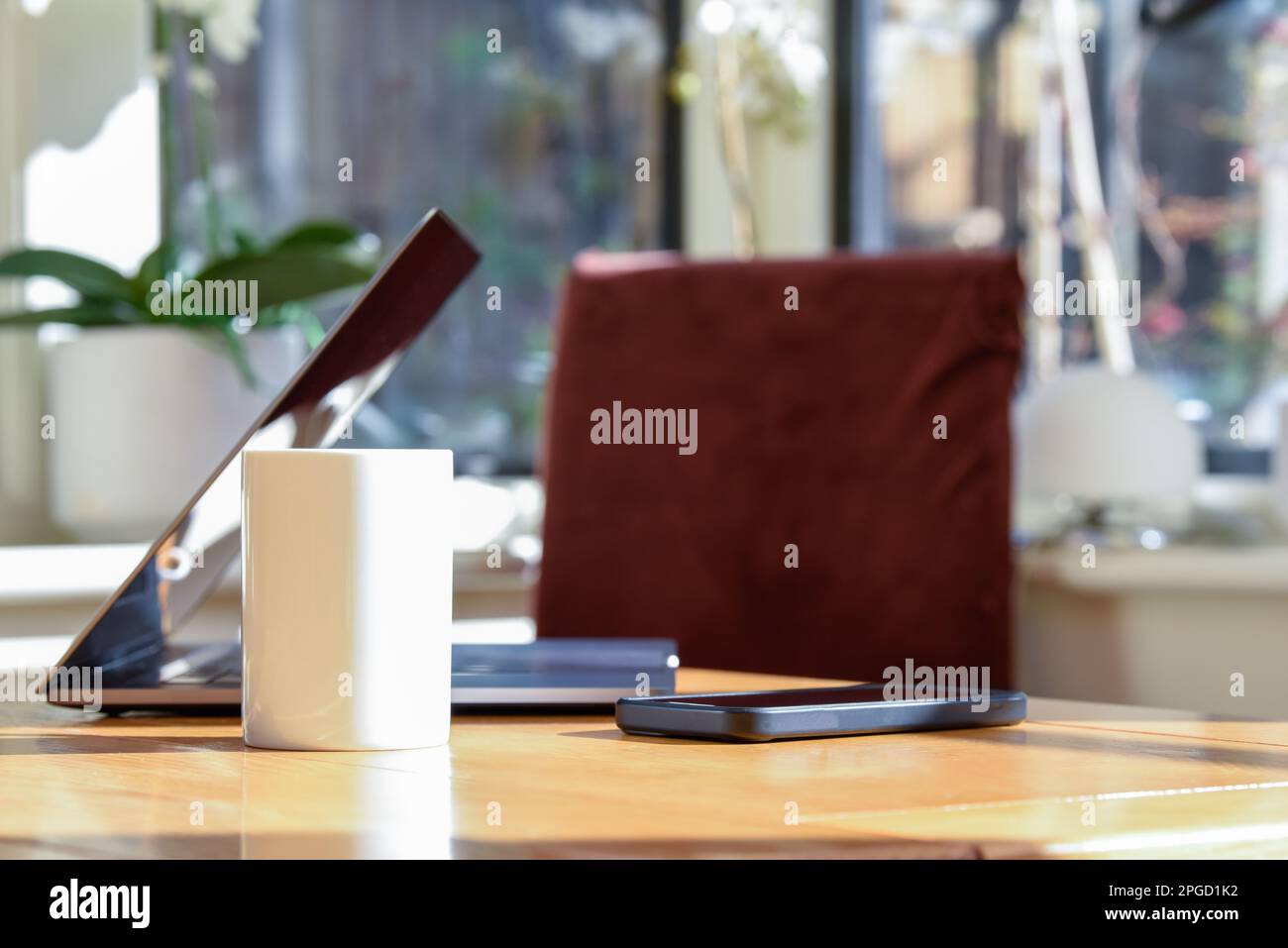 Remote working area with laptop setup to work from home Stock Photo Alamy