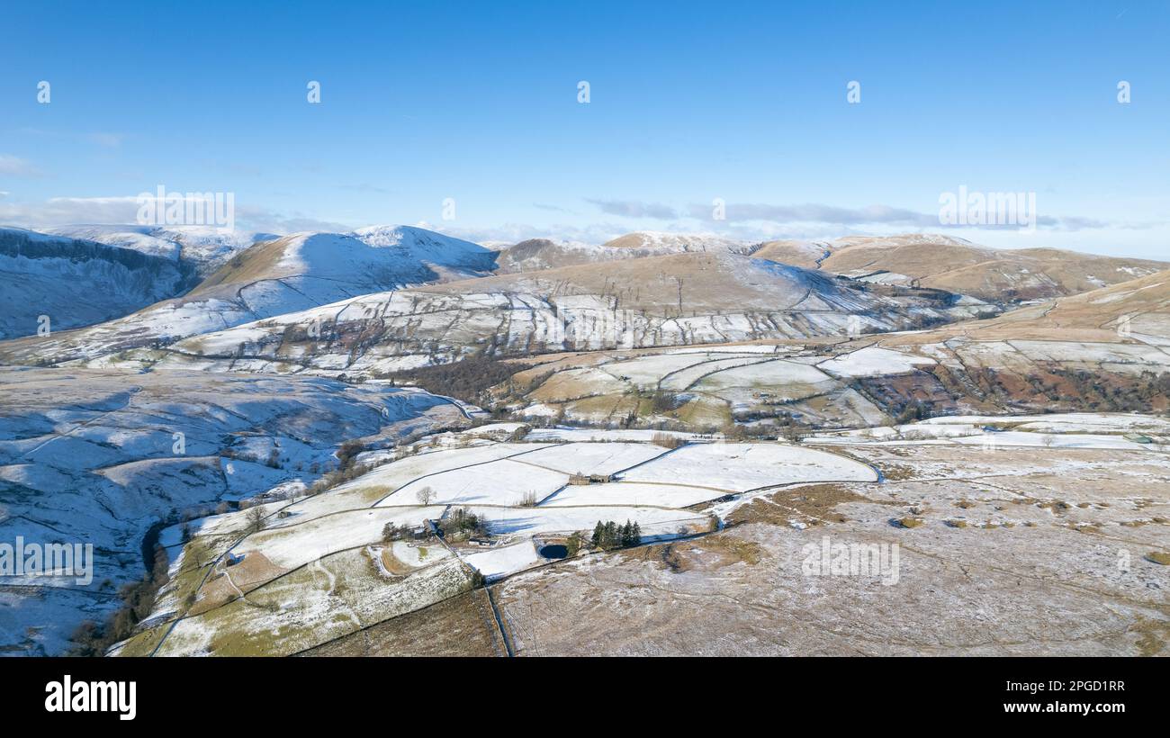 Farmland in winter at Fell End, on the edge of the Howgill Fells in Cumbria, part of the Yorkshire Dales National Park, UK. Stock Photo