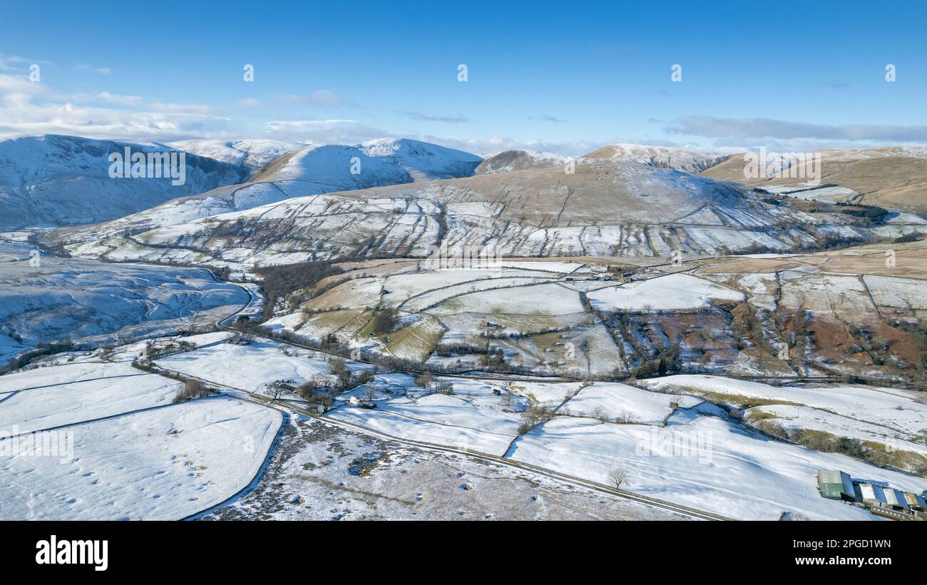 Farmland in winter at Fell End, on the edge of the Howgill Fells in Cumbria, part of the Yorkshire Dales National Park, UK. Stock Photo