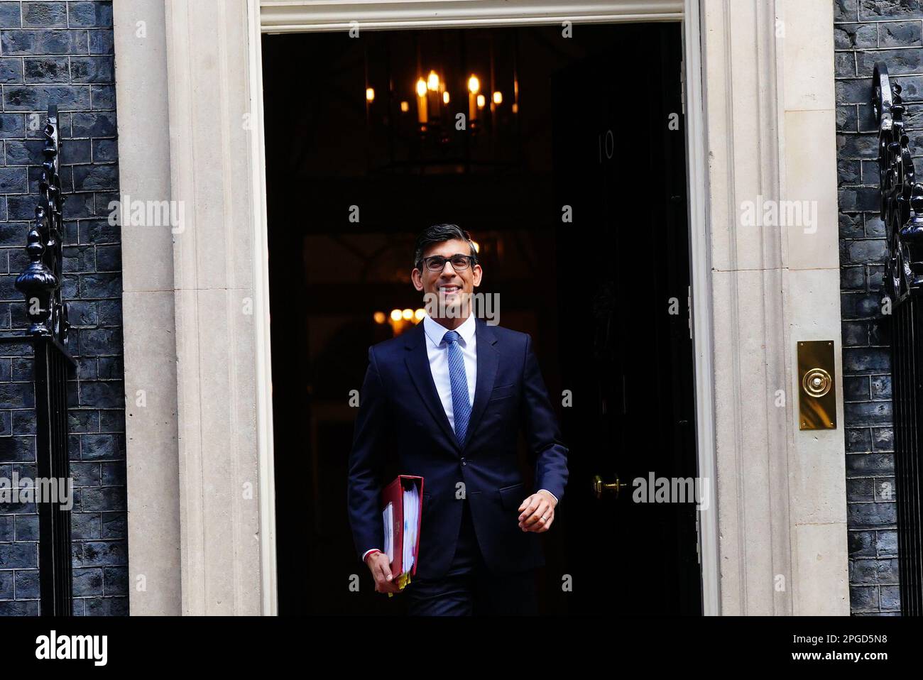 Prime Minister Rishi Sunak departs 10 Downing Street, London, to attend Prime Minister's Questions at the Houses of Parliament. Picture date: Wednesday March 22, 2023. Stock Photo