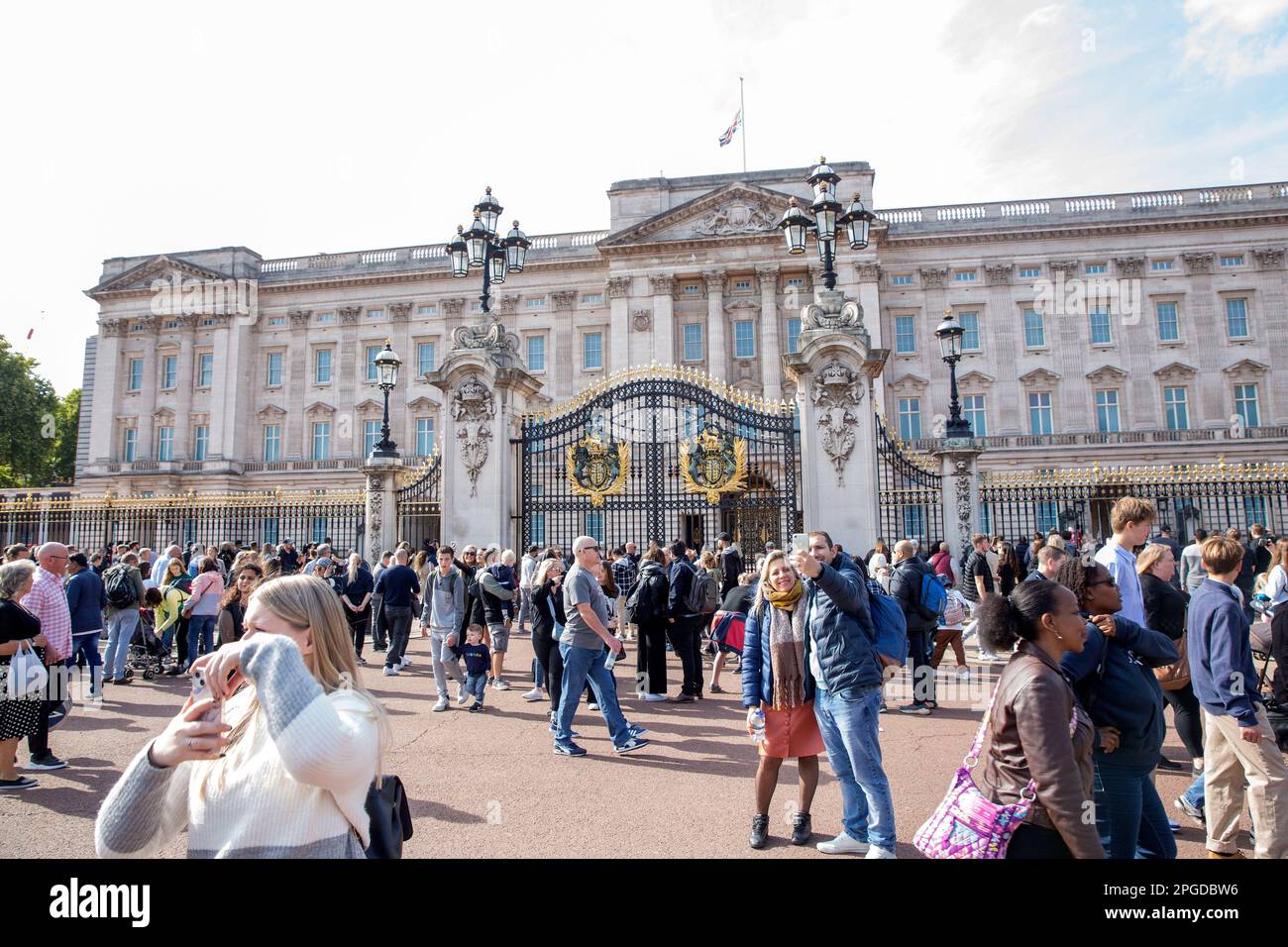 People gather around Buckingham Palace on the first Saturday since the state funeral of the late Queen Elizabeth II. Stock Photo