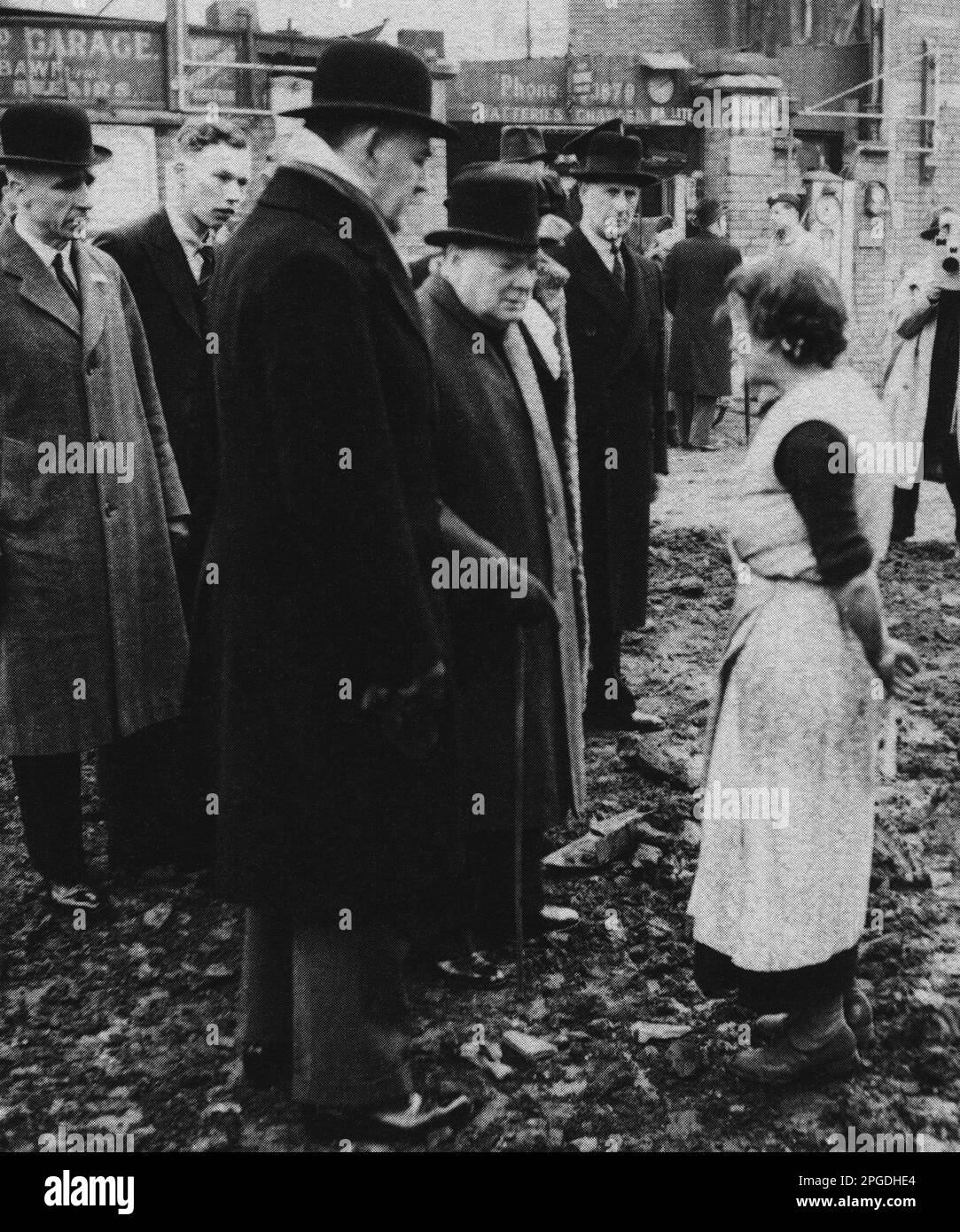 Winston Churchill talking to a survivor of the 11th September  bombing raid on Bristol. September 12th 1941 Stock Photo