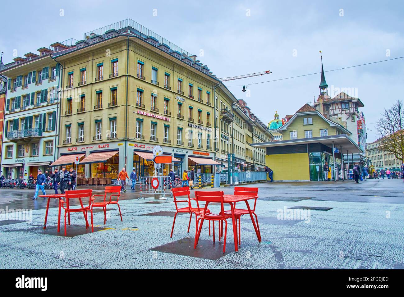 BERN, SWITZERLAND - MARCH 31, 2022: Urban scene on Waisenhausplatz square, one of the oldest in the city, on March 31 in Bern, Switzerland Stock Photo